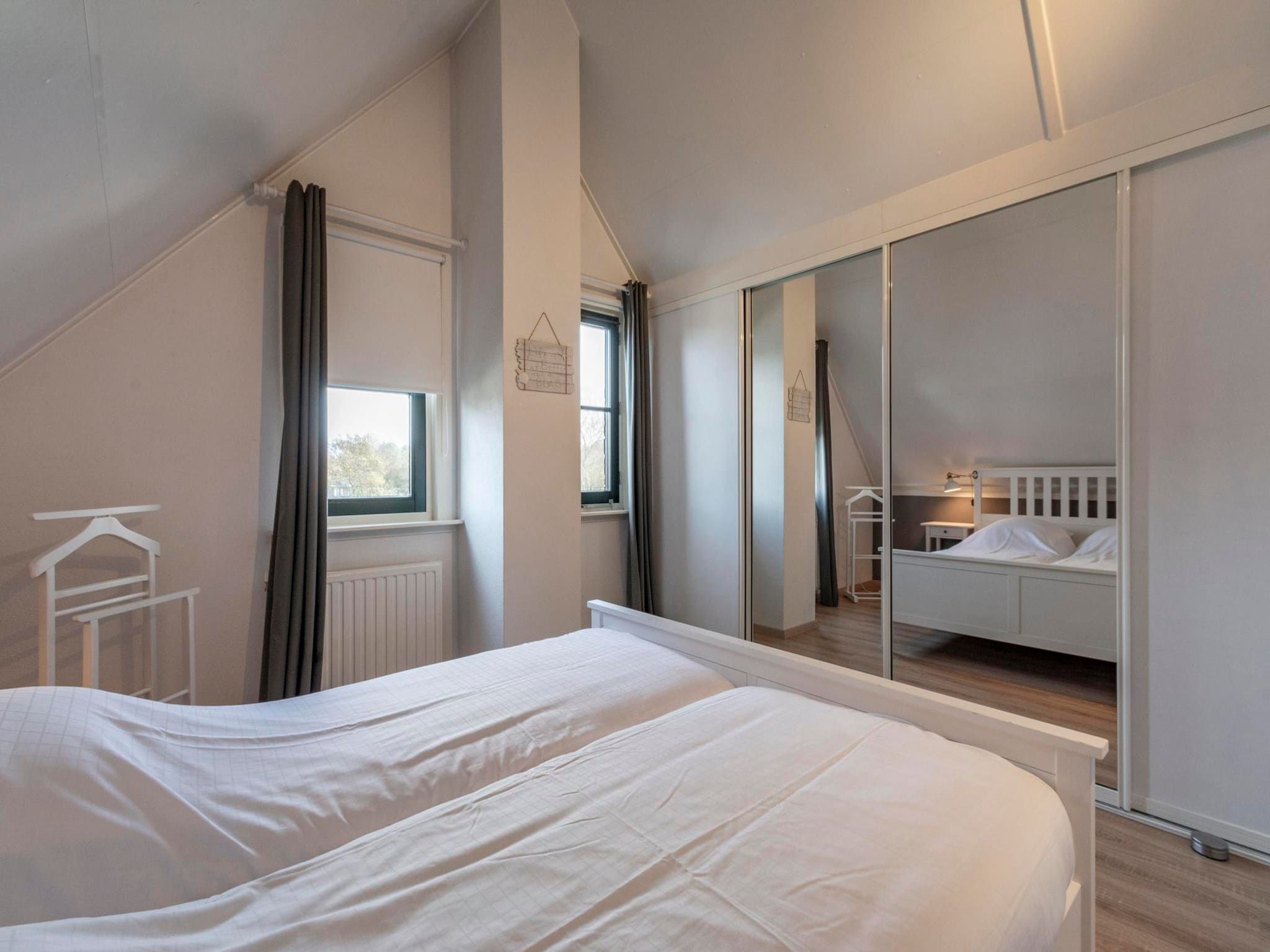 Een slaapkamer van Buitenplaats 27 - Callantsoog in Callantsoog
