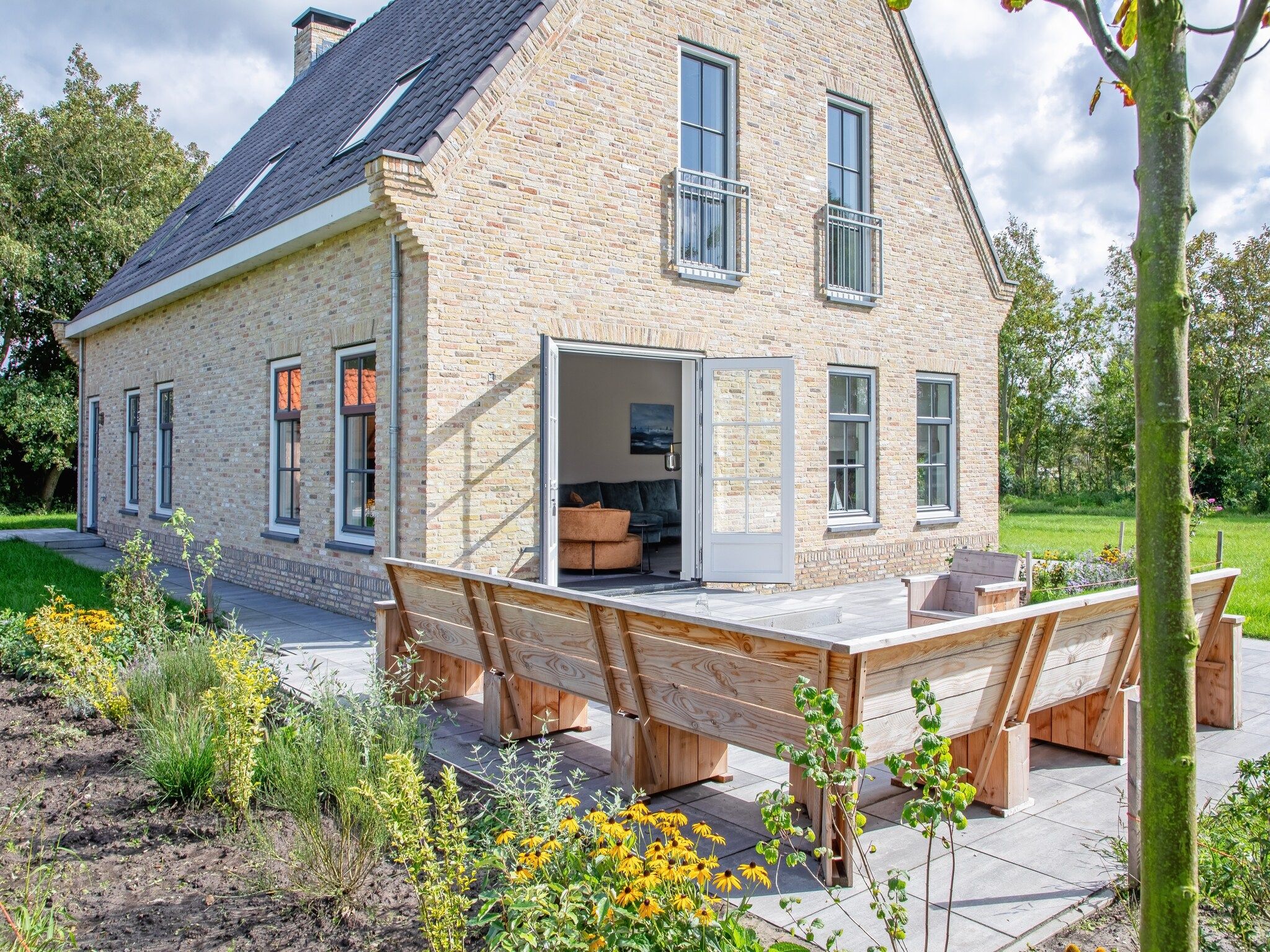 Het terras van Familievilla Nieuw-Zeeland in Oosterend