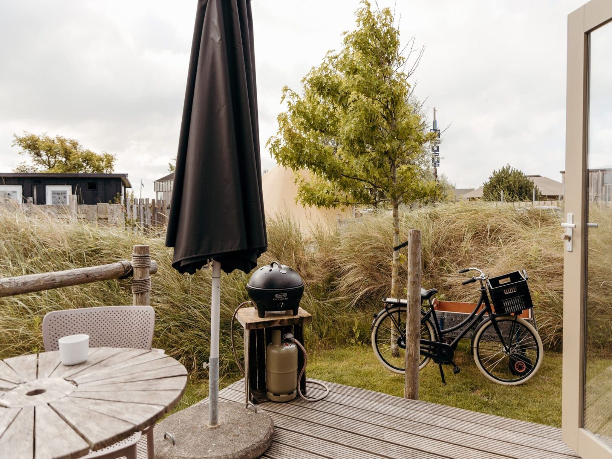 De tuin van Reddingshuisje - Duynpark in Callantsoog