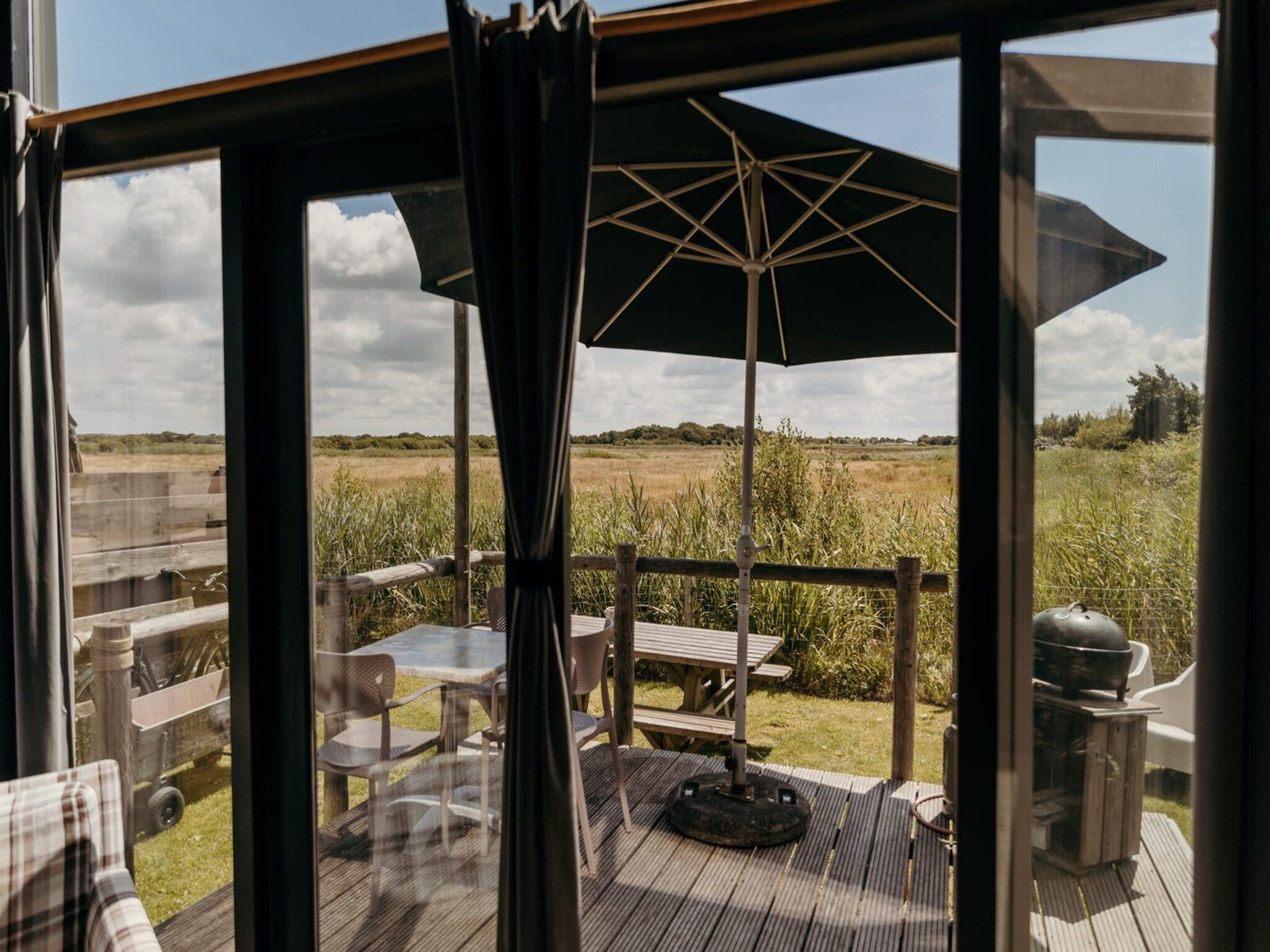 Het terras van Reddingshuisje - Duynpark in Callantsoog