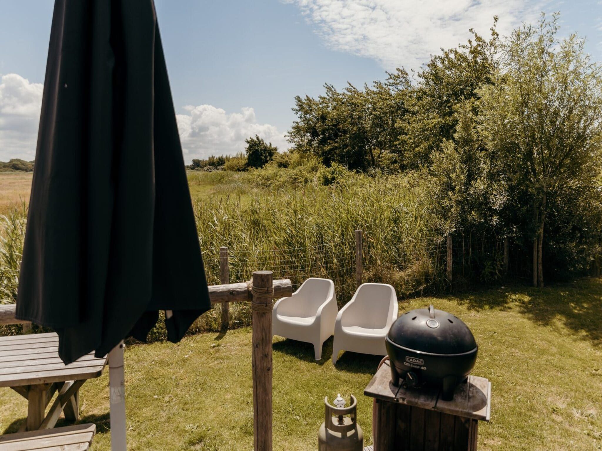 De tuin van Reddingshuisje - Duynpark in Callantsoog