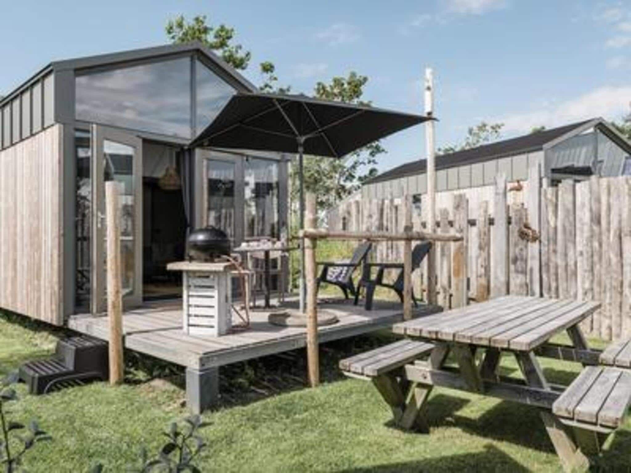Het terras van Reddingshuisje - Duynpark in Callantsoog