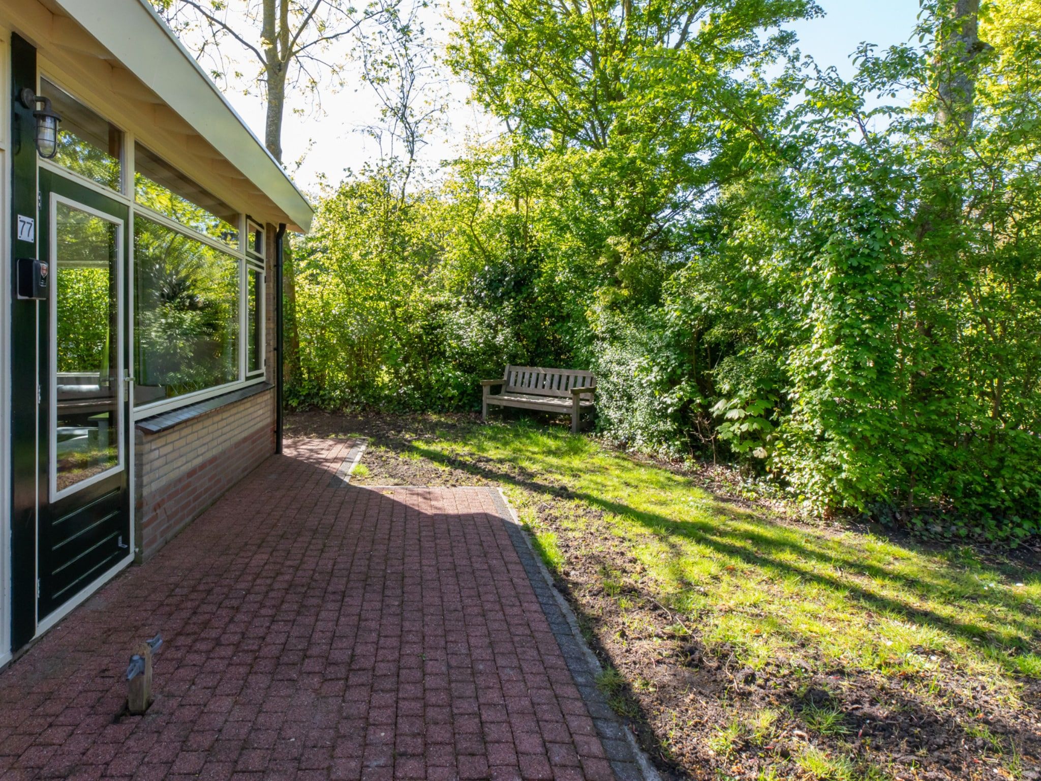 De tuin van Vakantiehuis - Oosterpark 77 - Oostkapelle in Oostkapelle