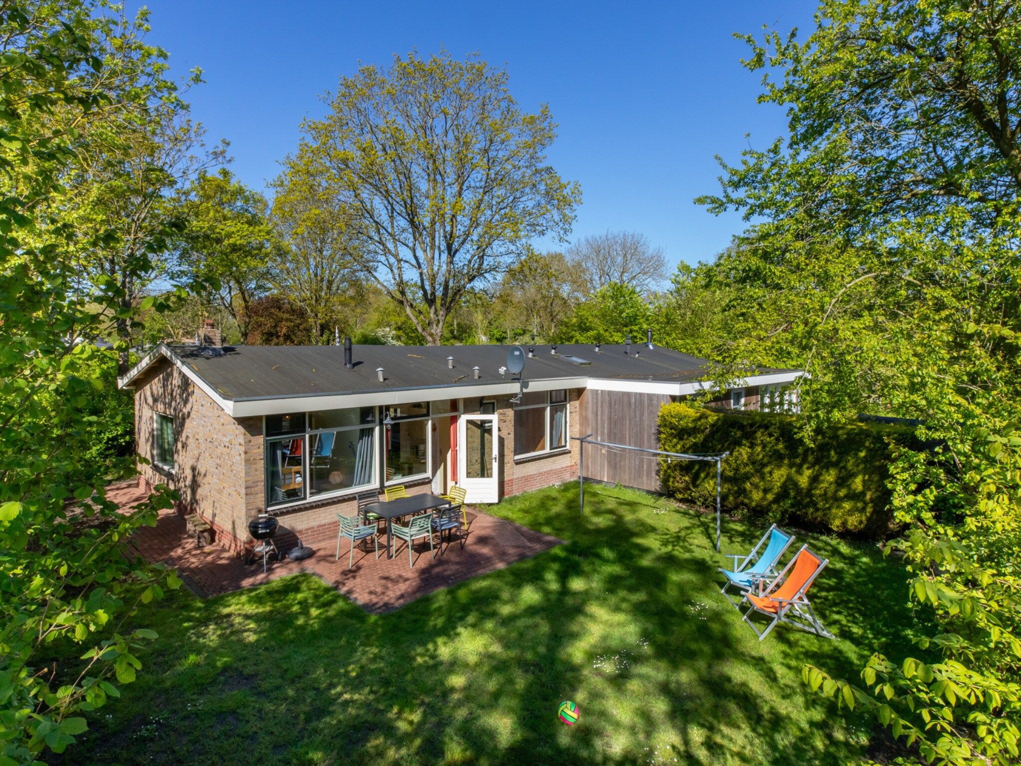 De tuin van Vakantiehuis - Oosterpark 77 - Oostkapelle in Oostkapelle