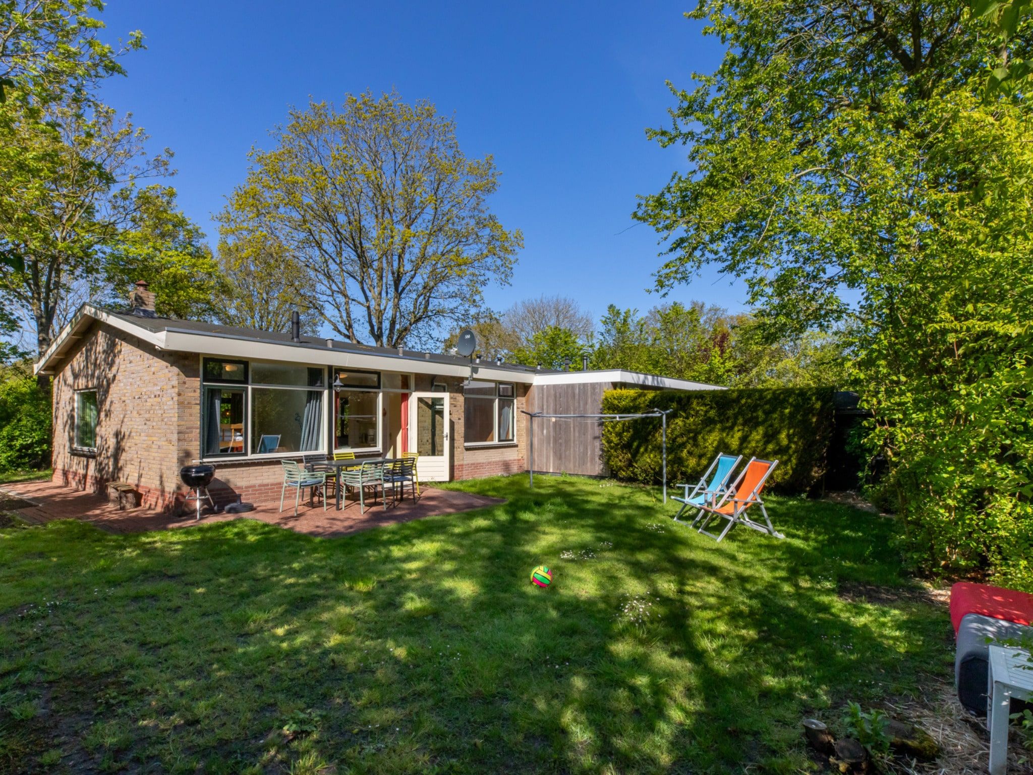 De tuin van Vakantiehuis - Oosterpark 77 - Oostkapelle in Oostkapelle