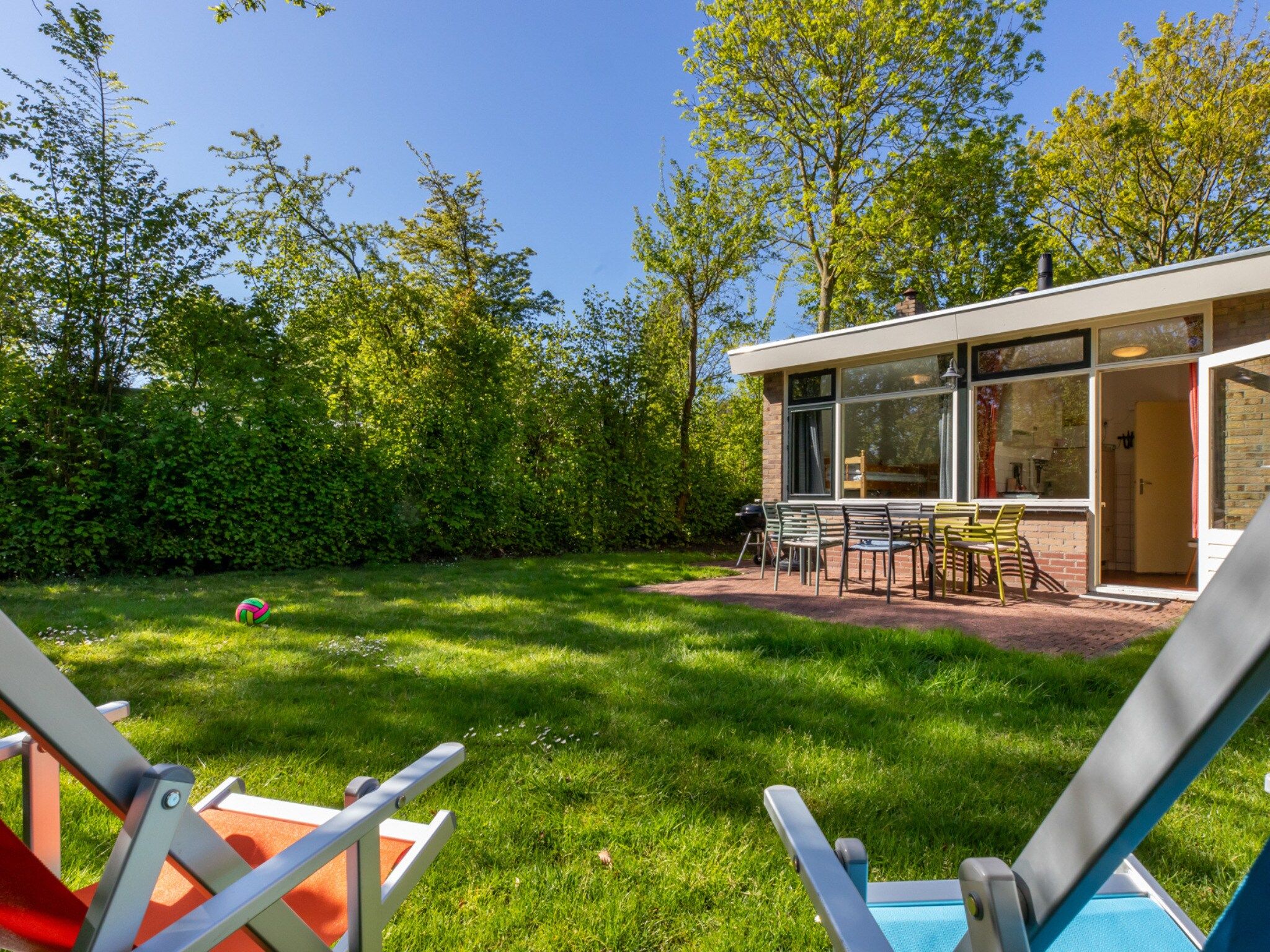 De tuin van Vakantiehuis - Oosterpark 77 - Oostkapelle in Oostkapelle