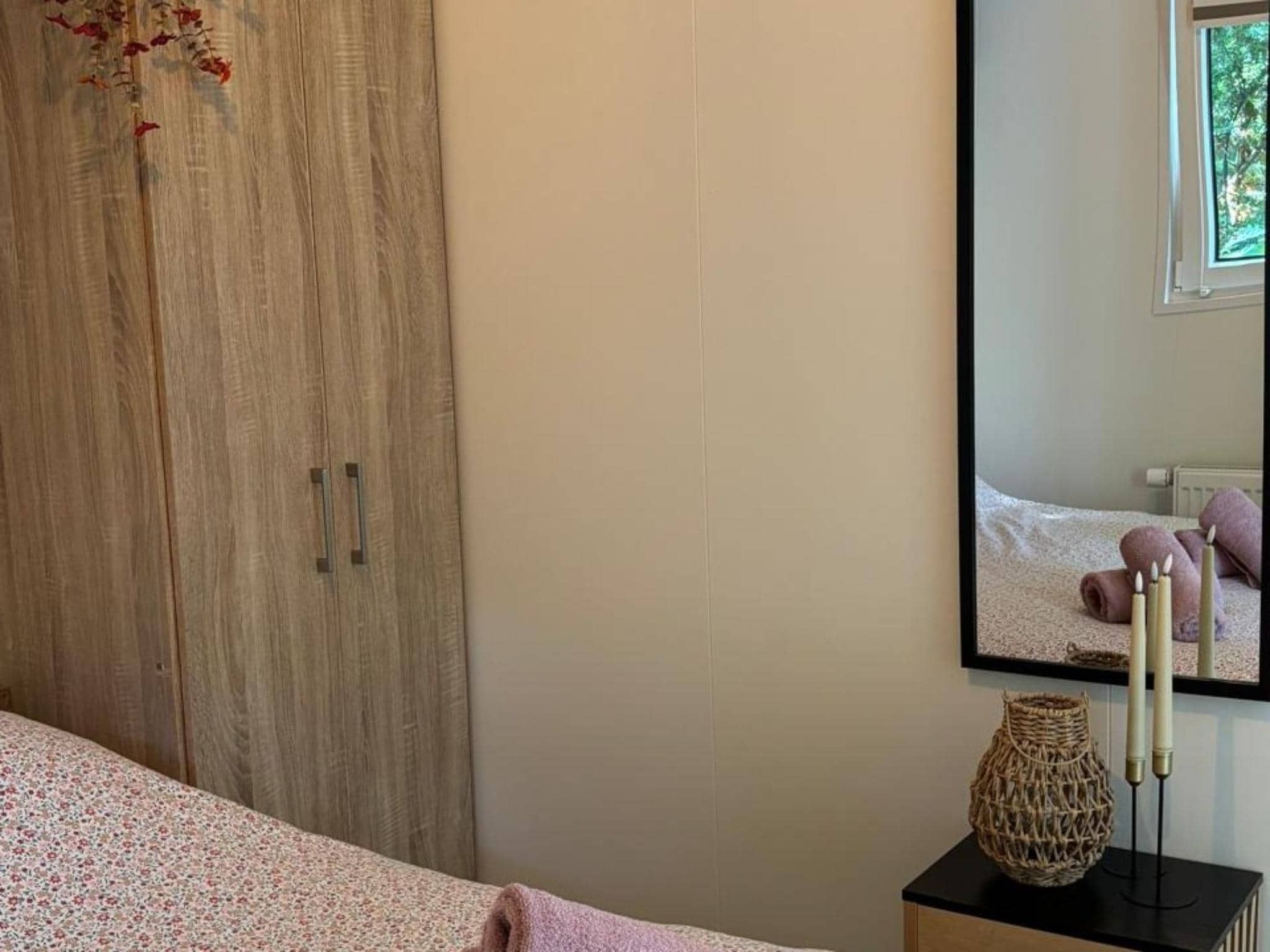 Een slaapkamer van Lodge David in Hattemerbroek