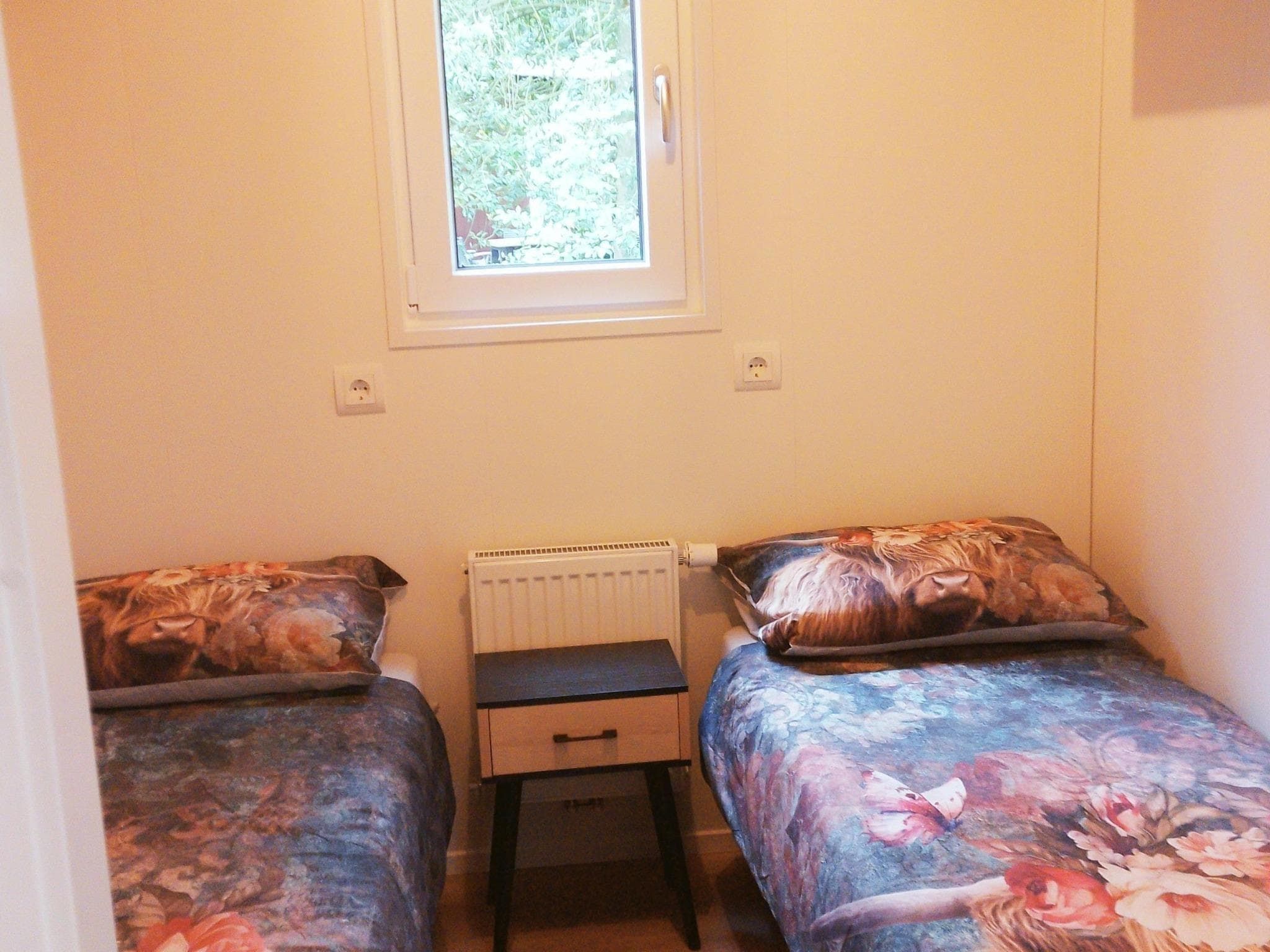 Een slaapkamer van Lodge David in Hattemerbroek
