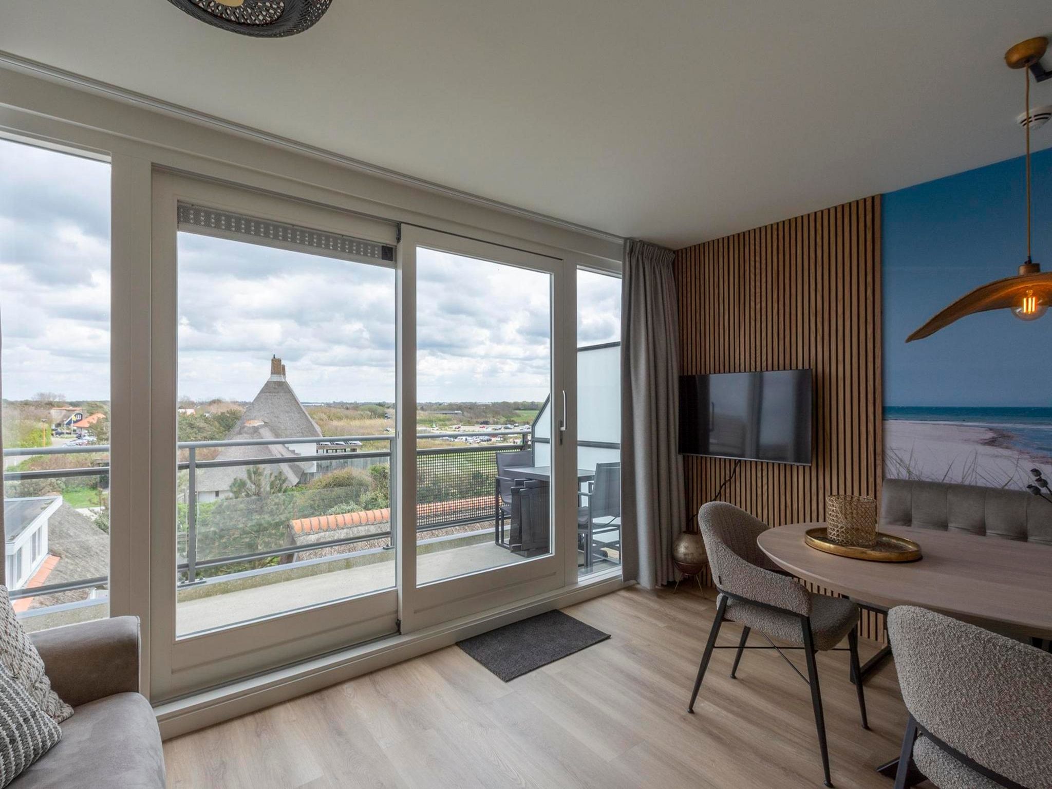 De woonkamer van Wijde Blick 301 in Callantsoog