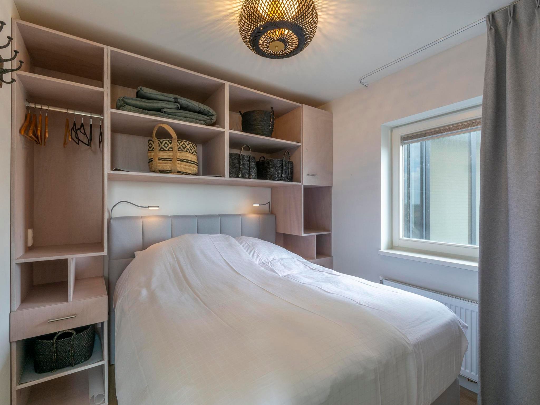 Een slaapkamer van Wijde Blick 301 in Callantsoog