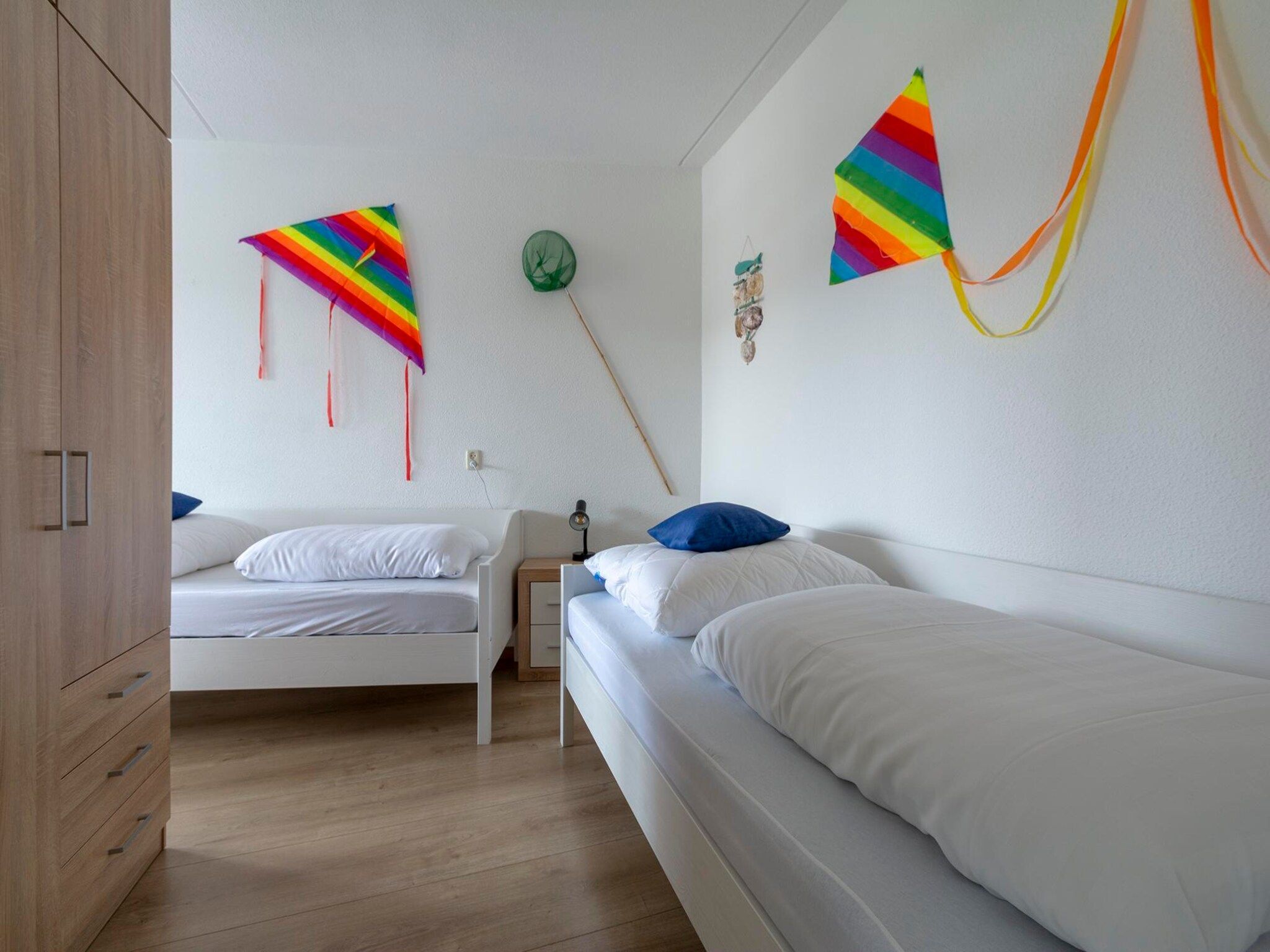 Een slaapkamer van Résidence Juliana 53 in Julianadorp aan Zee