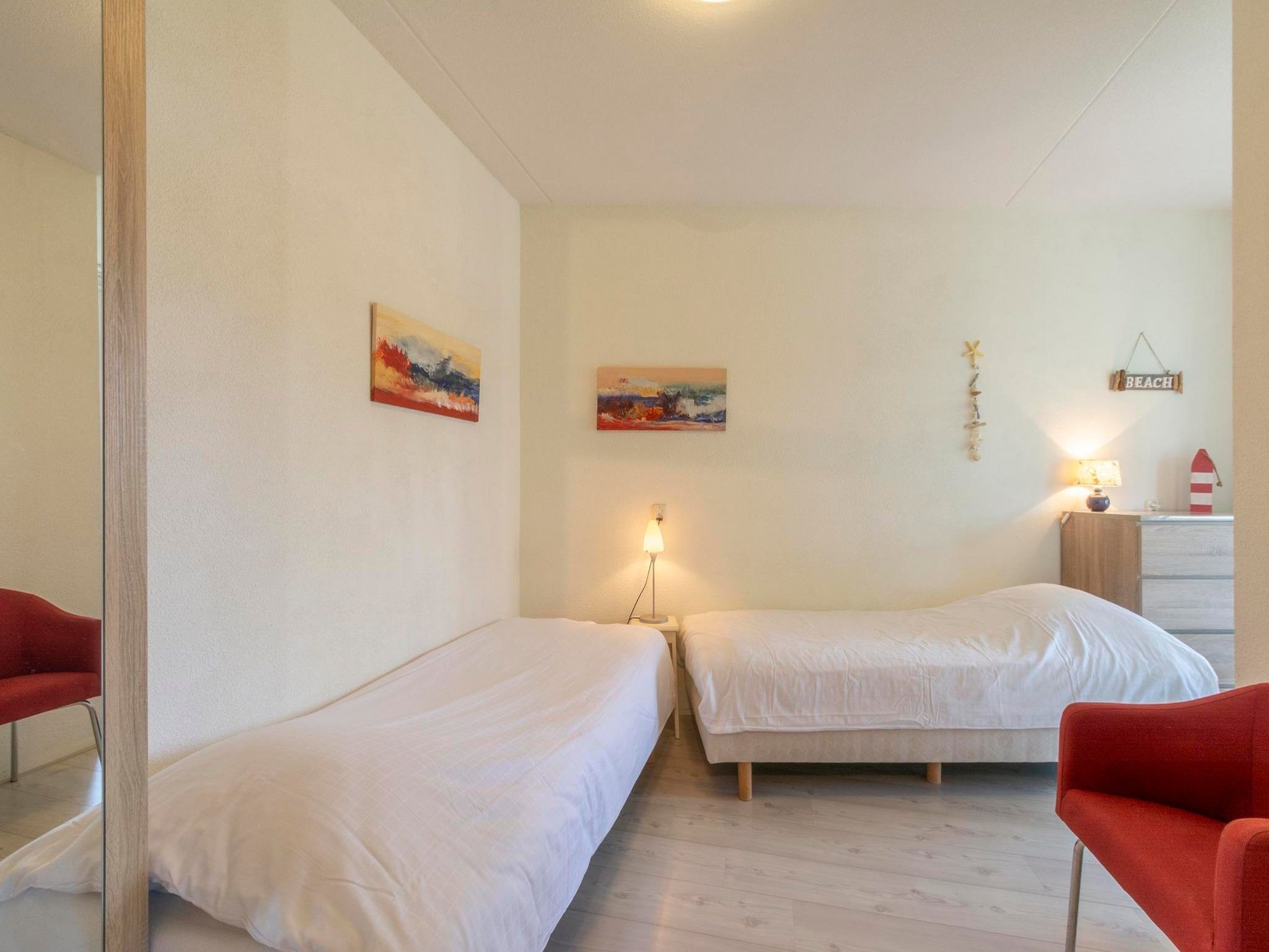 Een slaapkamer van Résidence Juliana 34 in Julianadorp aan Zee