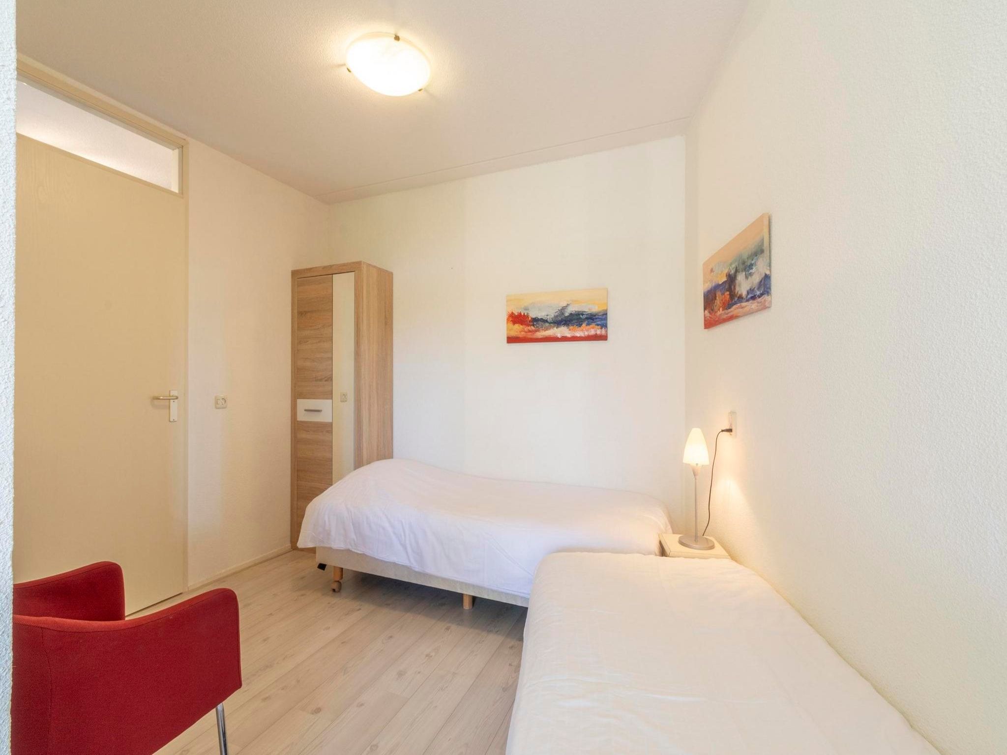 Een slaapkamer van Résidence Juliana 34 in Julianadorp aan Zee