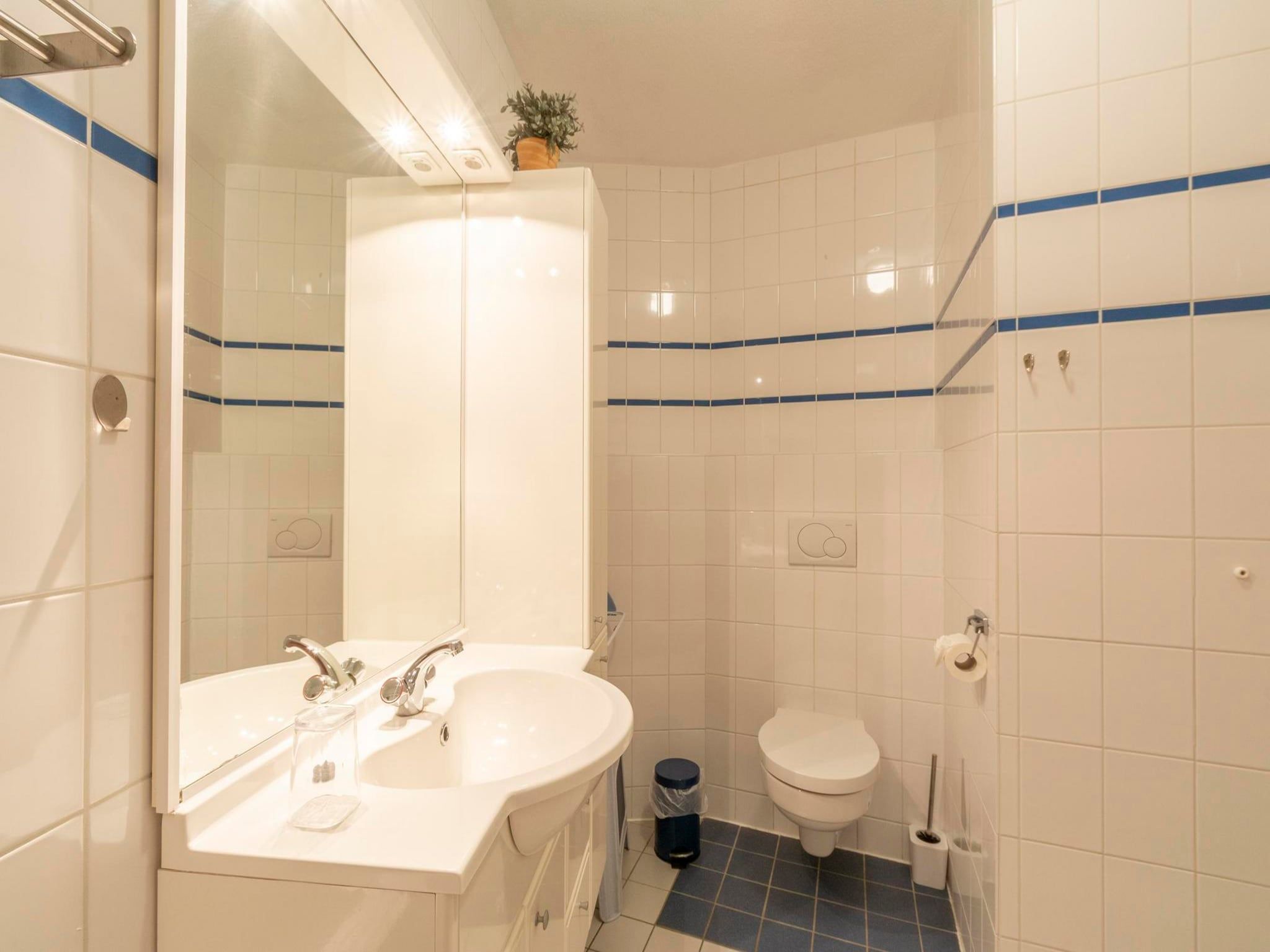 De badkamer van Résidence Juliana 34 in Julianadorp aan Zee