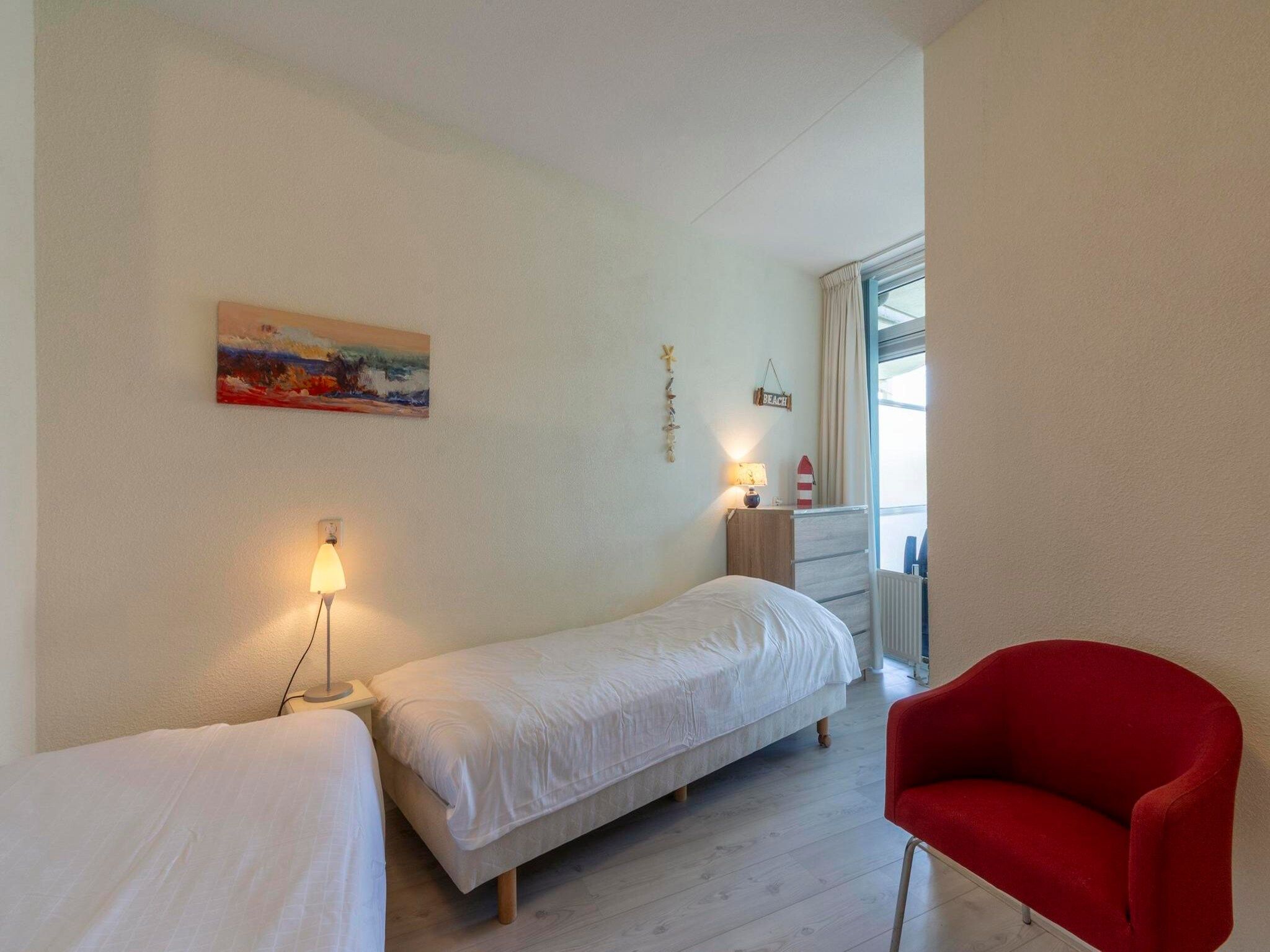 Een slaapkamer van Résidence Juliana 34 in Julianadorp aan Zee