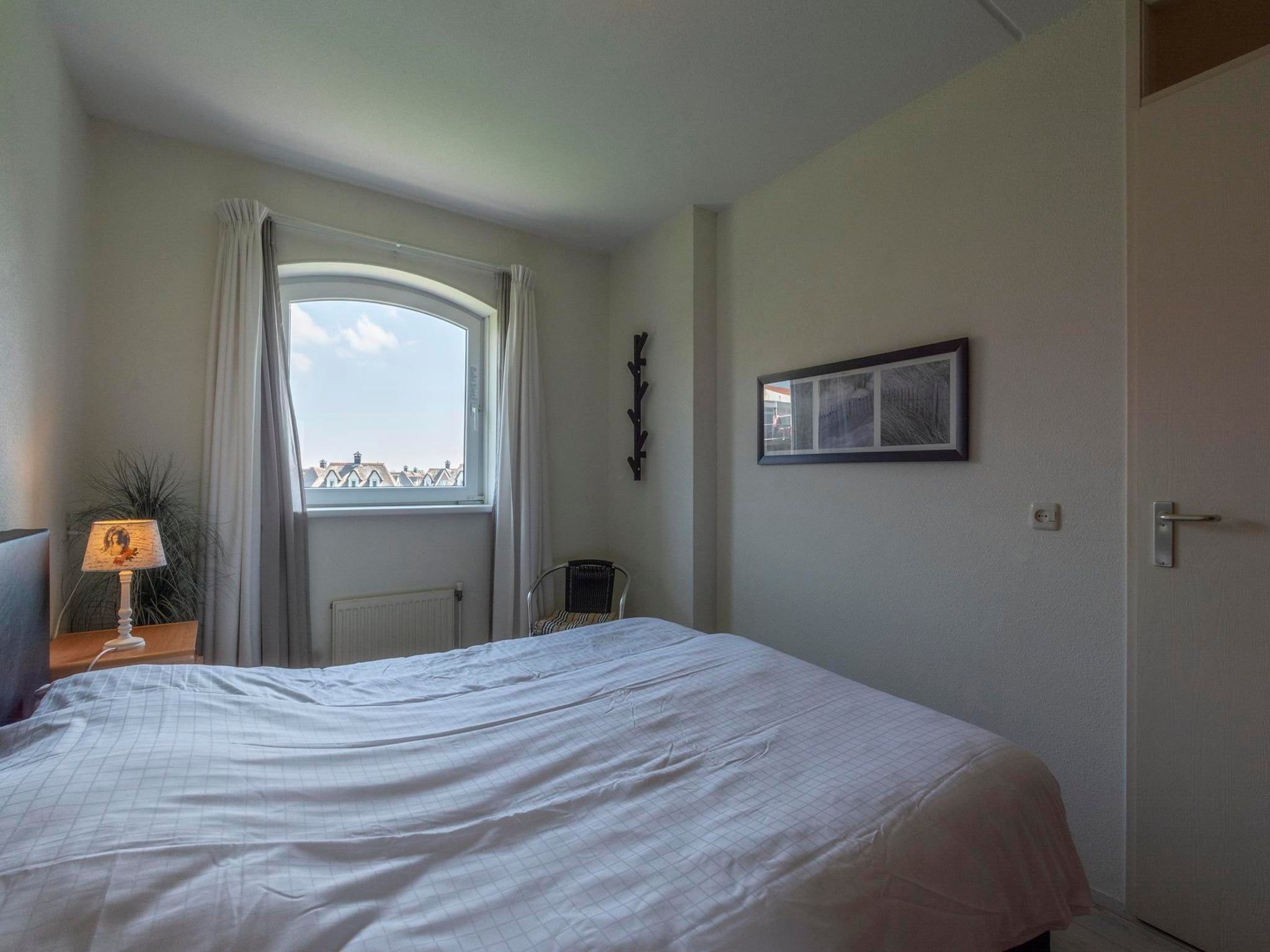 Een slaapkamer van Résidence Juliana 34 in Julianadorp aan Zee