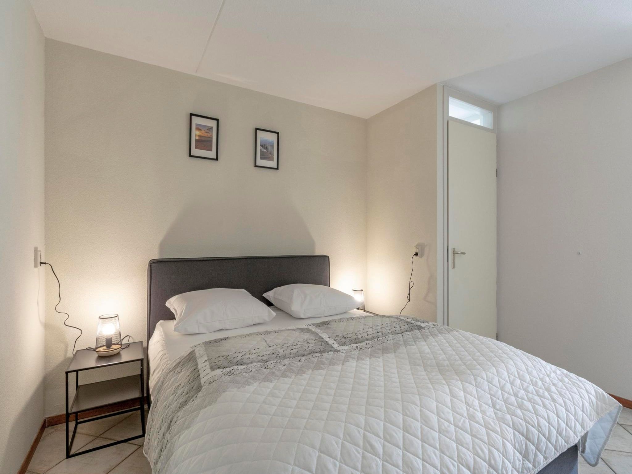 Een slaapkamer van Wijde Blick 309 in Callantsoog