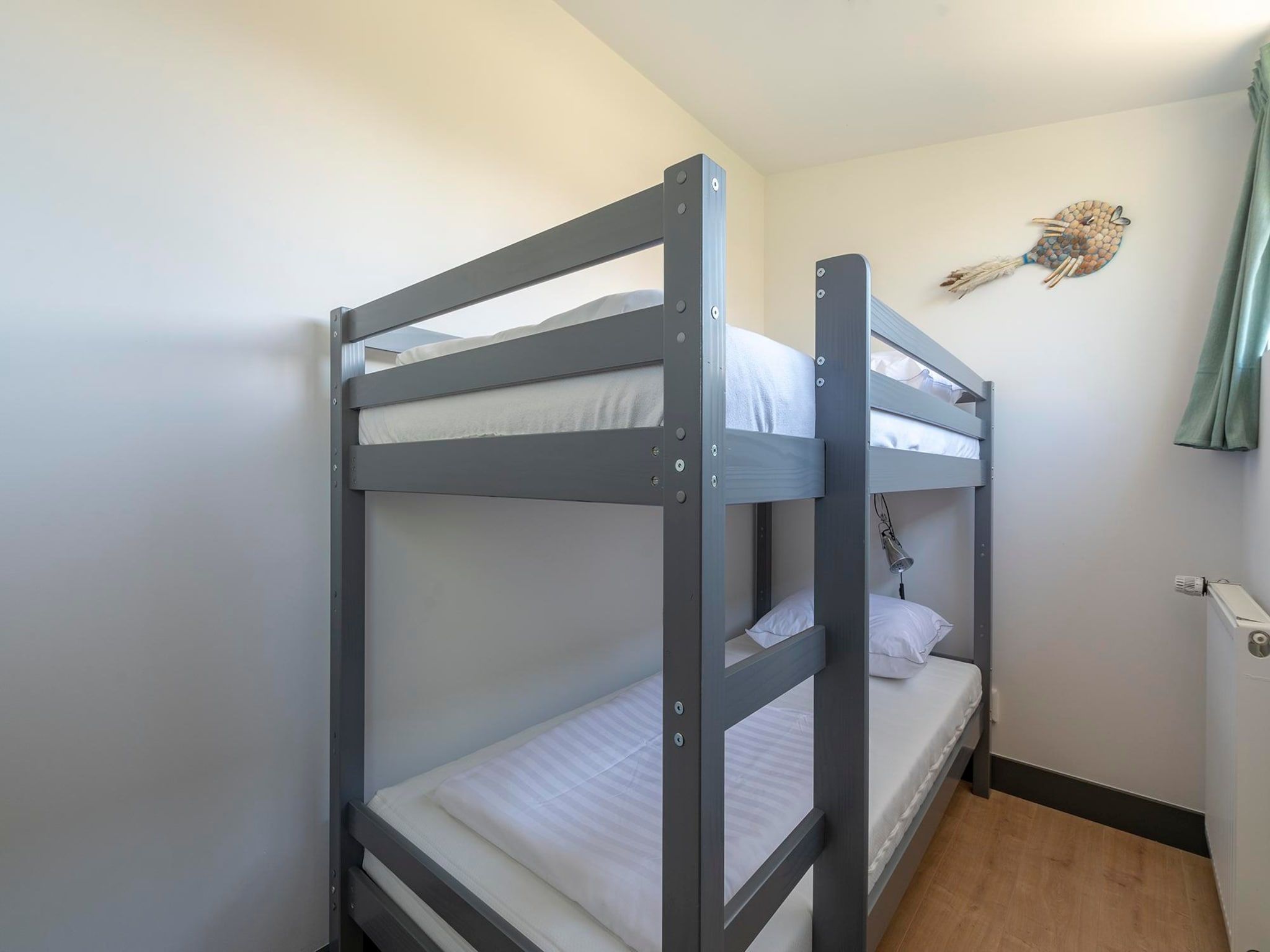 Een slaapkamer van Previnaireweg 34 in Callantsoog