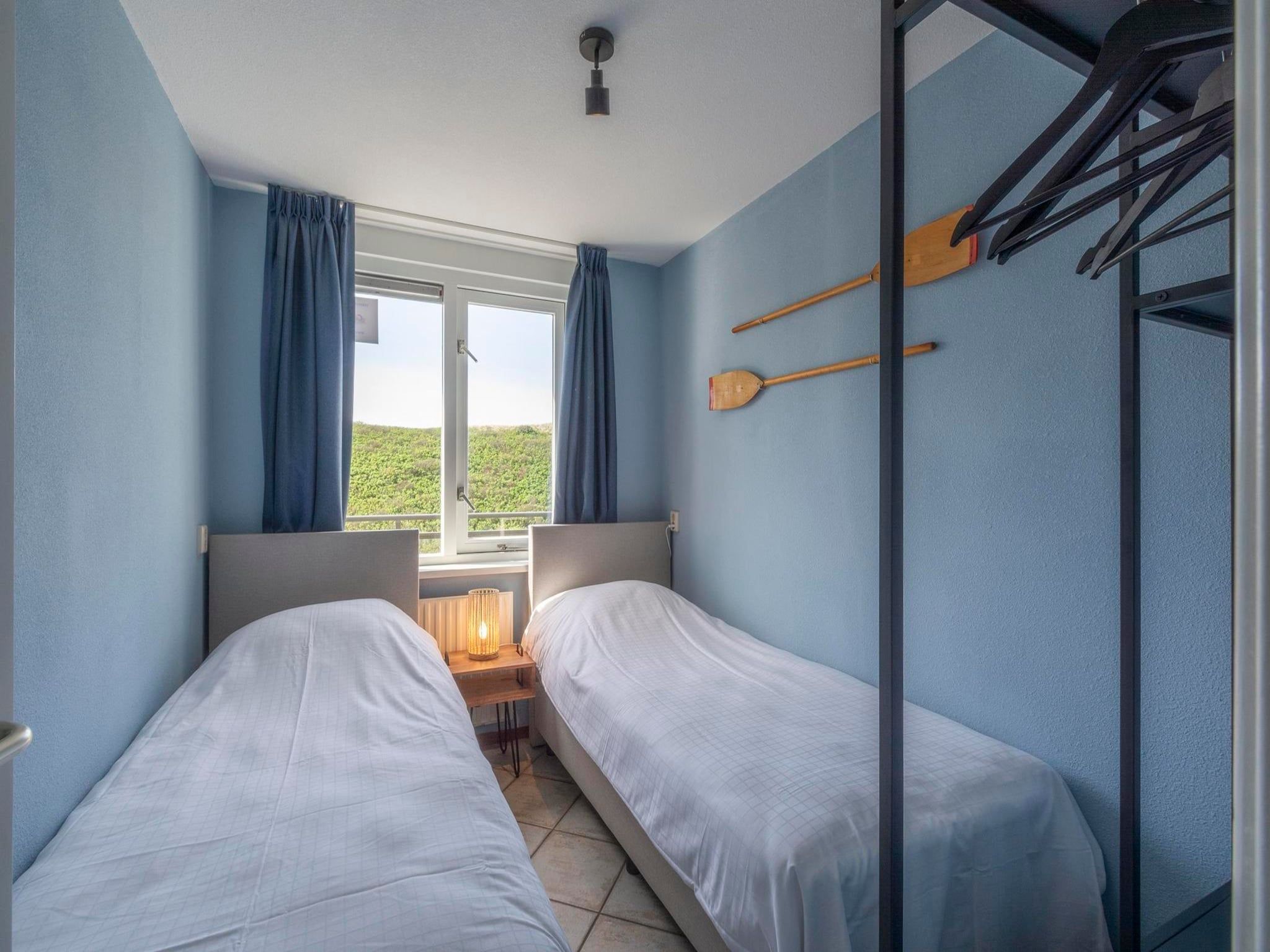 Een slaapkamer van Wijde Blick 310 in Callantsoog