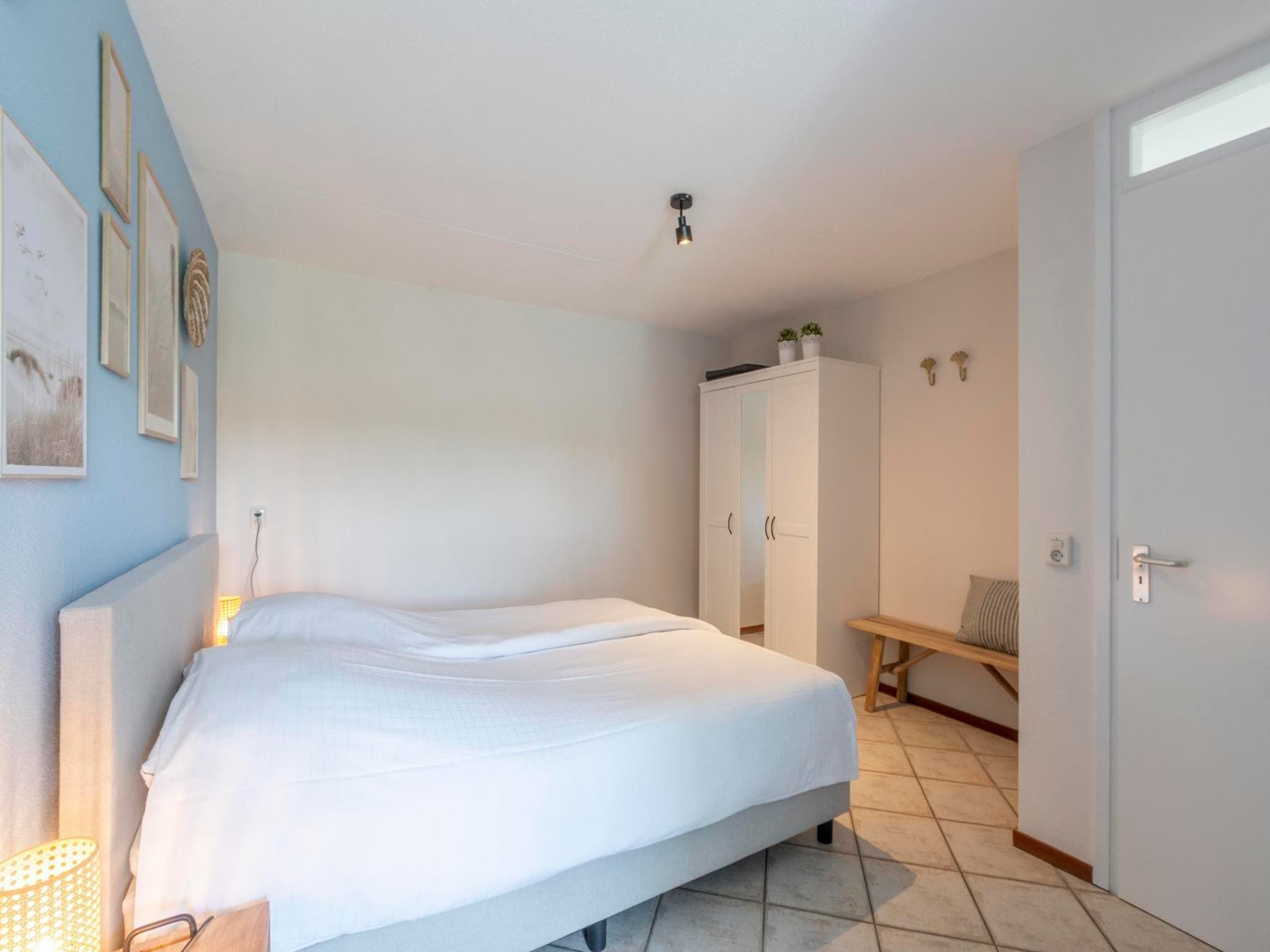 Een slaapkamer van Wijde Blick 310 in Callantsoog