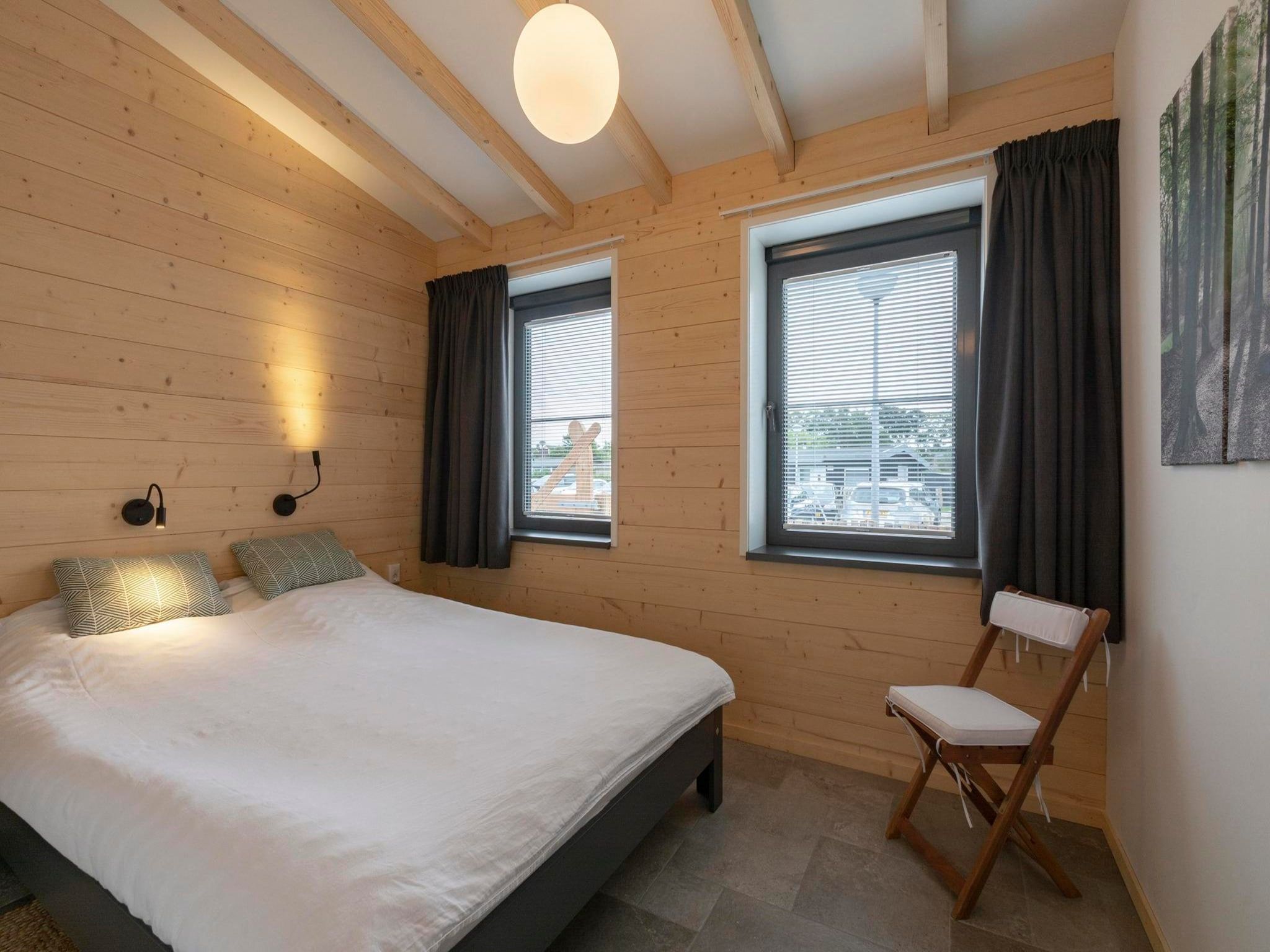 Een slaapkamer van Previnaireweg 5 in Callantsoog