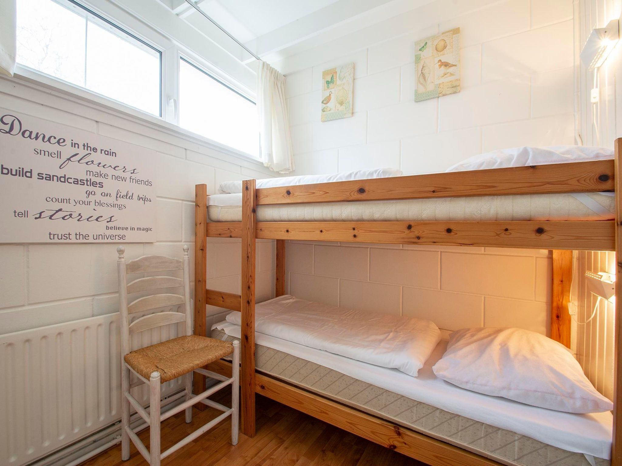 Een slaapkamer van Wildrijk 152 in Sint Maartenszee
