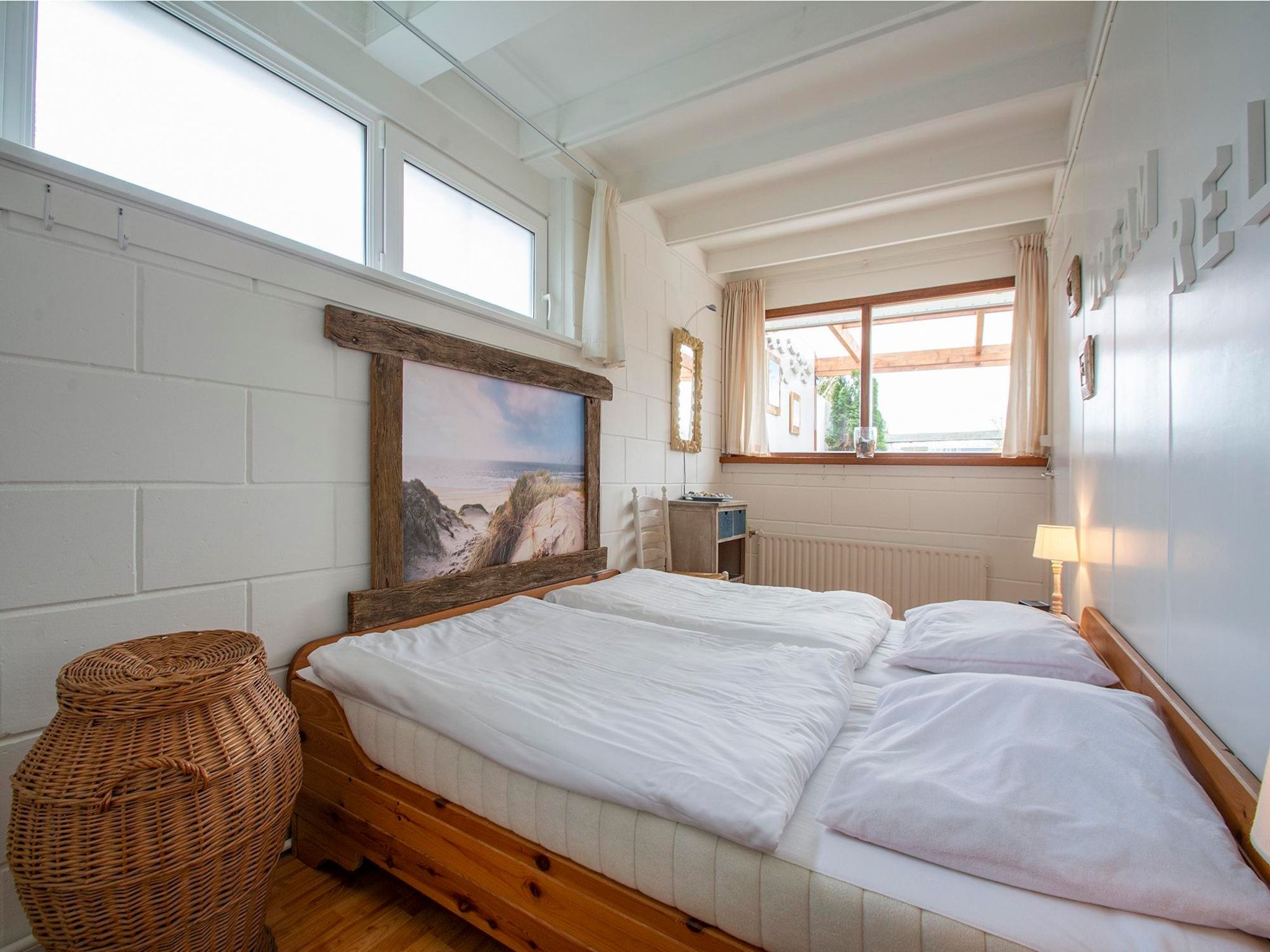 Een slaapkamer van Wildrijk 152 in Sint Maartenszee
