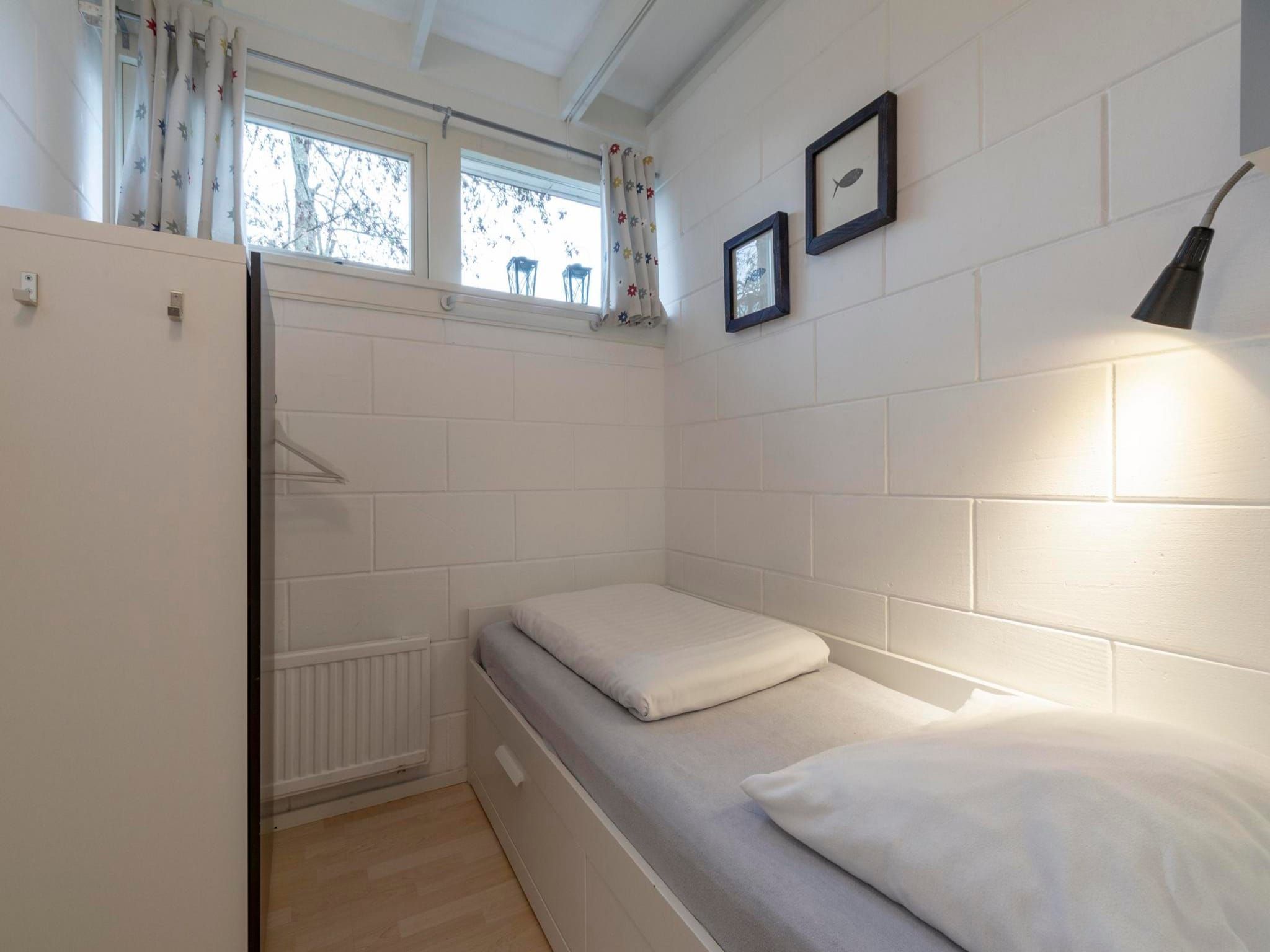 Een slaapkamer van Wildrijk 83 in Sint Maartenszee