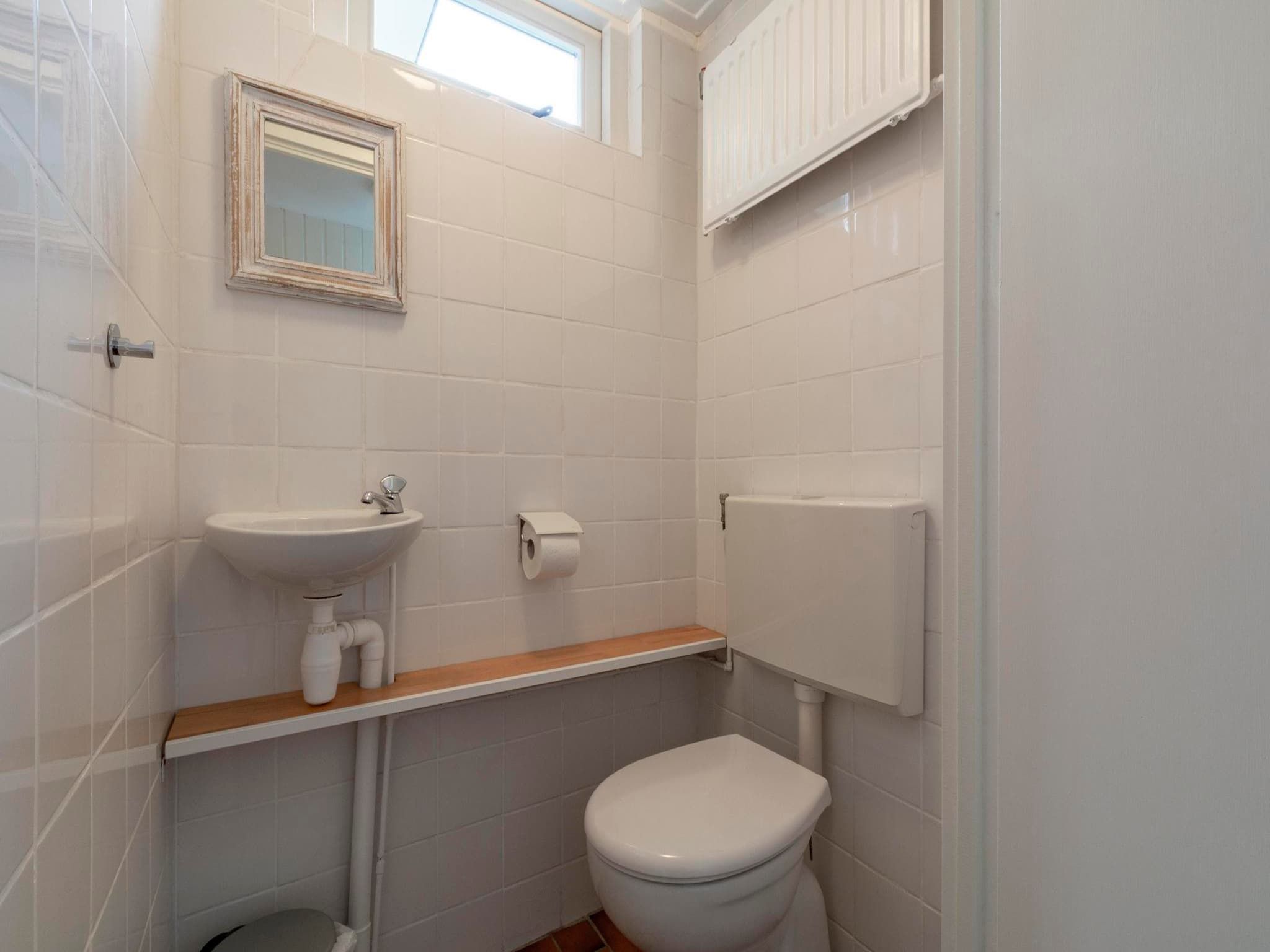 De badkamer van Wildrijk 83 in Sint Maartenszee