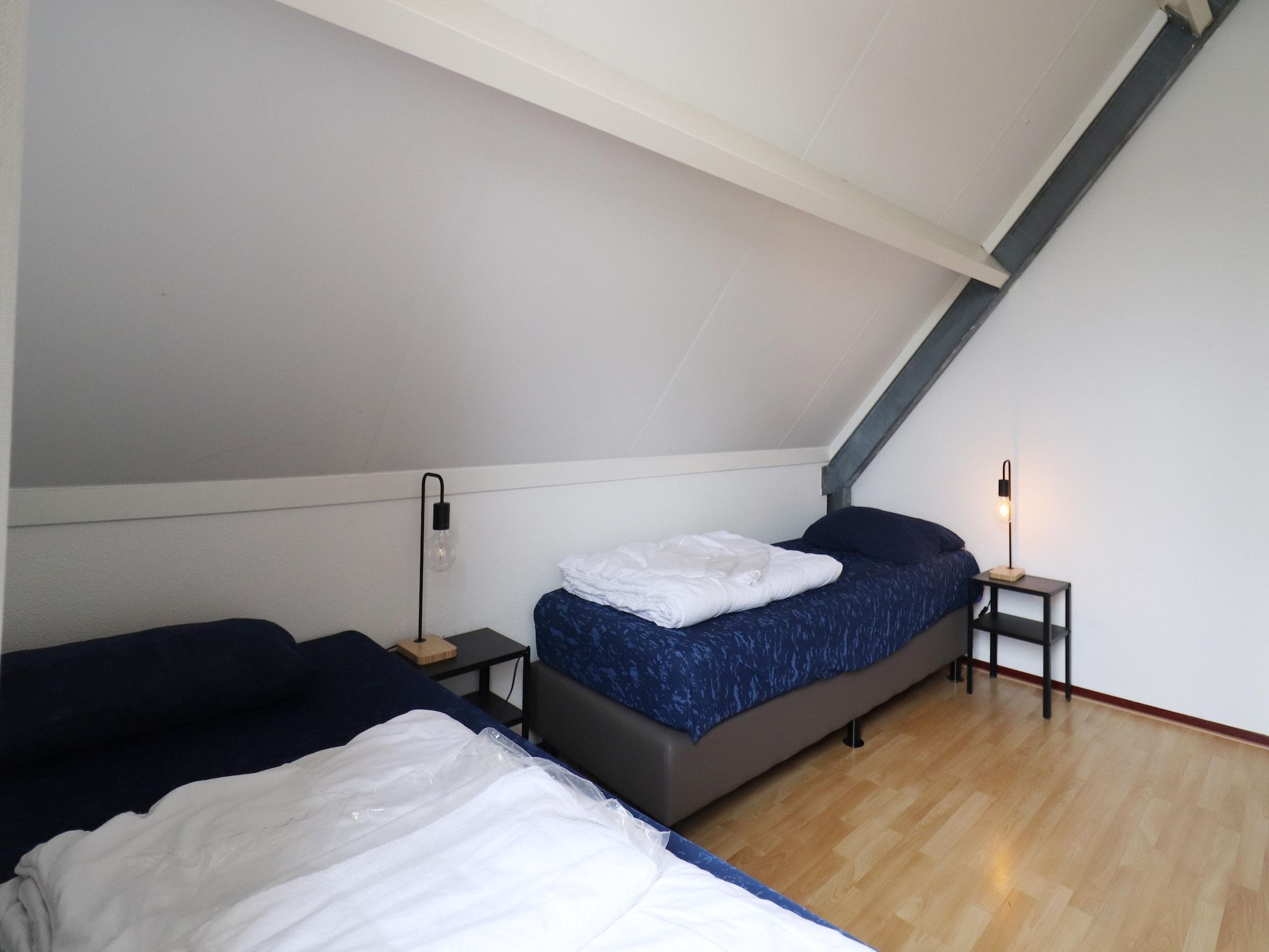 Een slaapkamer van Villapark Zuytland Buiten 24 in Simonshaven