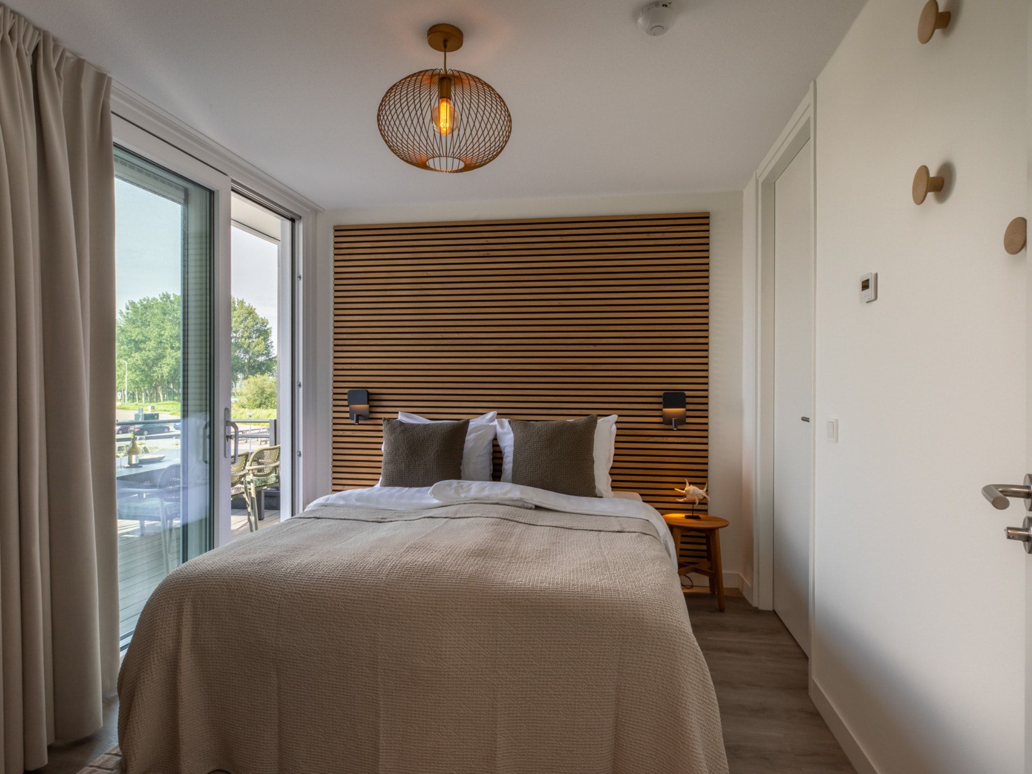 Een slaapkamer van Luxe appartement Vista Maris - Havenweg 8-36 'Oester Oase' in Sint-Annaland