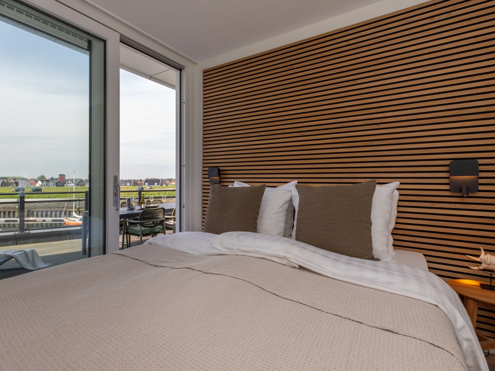 Een slaapkamer van Luxe appartement Vista Maris - Havenweg 8-36 'Oester Oase' in Sint-Annaland