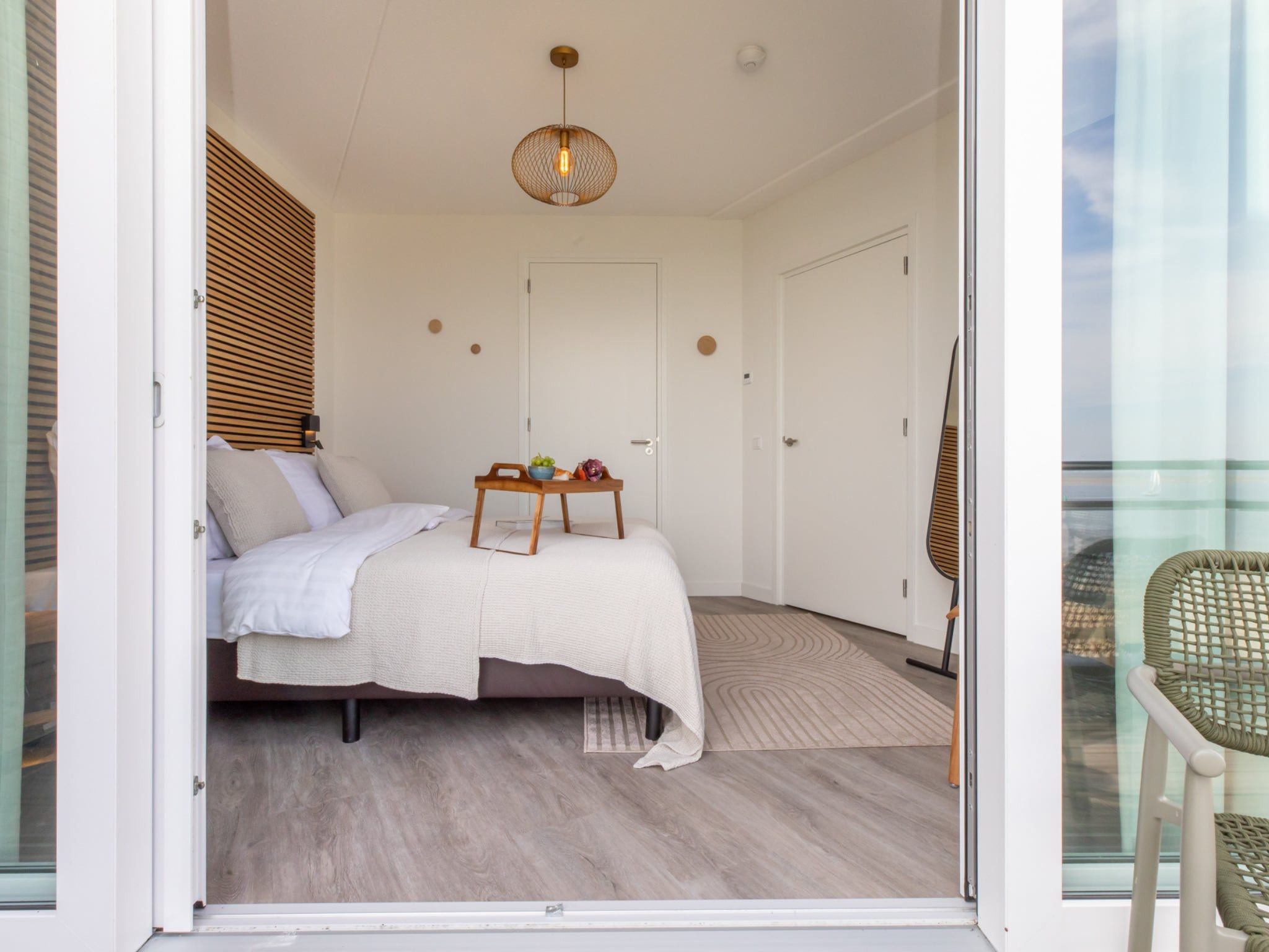 Een slaapkamer van Luxe appartement Vista Maris - Havenweg 8-36 'Oester Oase' in Sint-Annaland