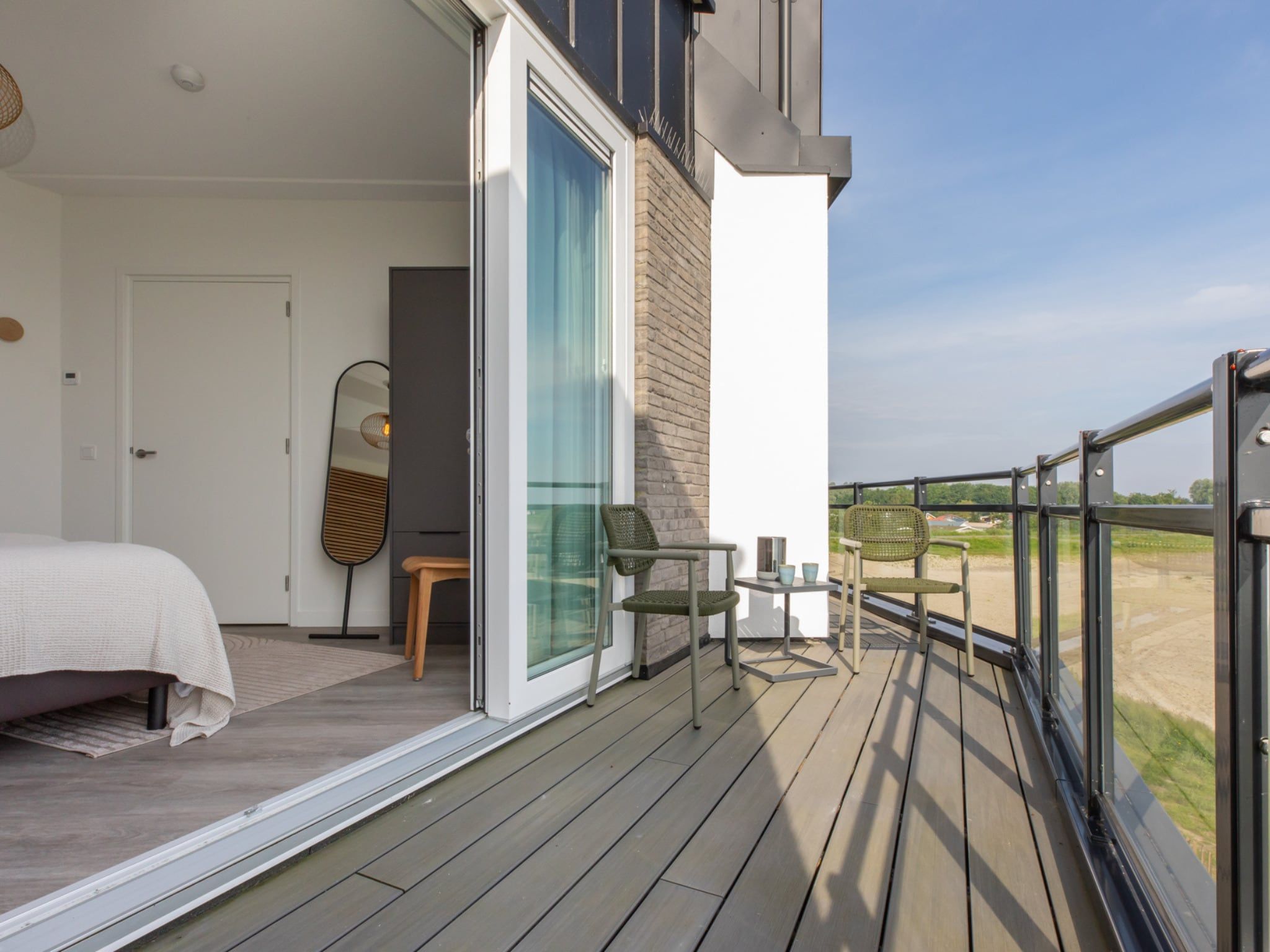 Een slaapkamer van Luxe appartement Vista Maris - Havenweg 8-36 'Oester Oase' in Sint-Annaland