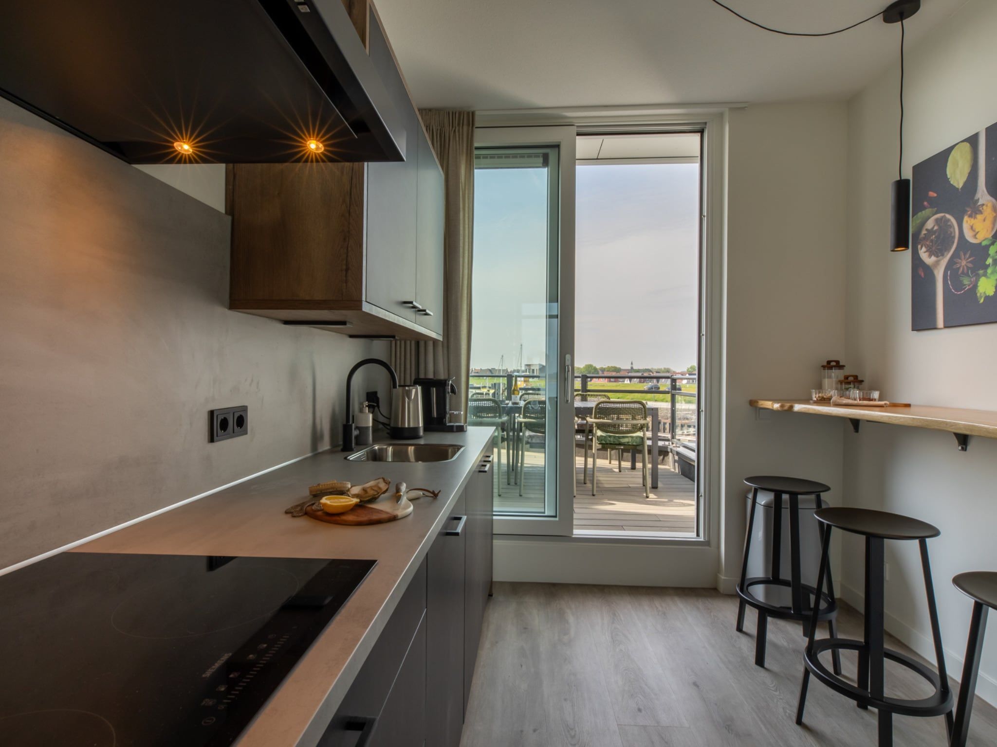 De keuken van Luxe appartement Vista Maris - Havenweg 8-36 'Oester Oase' in Sint-Annaland