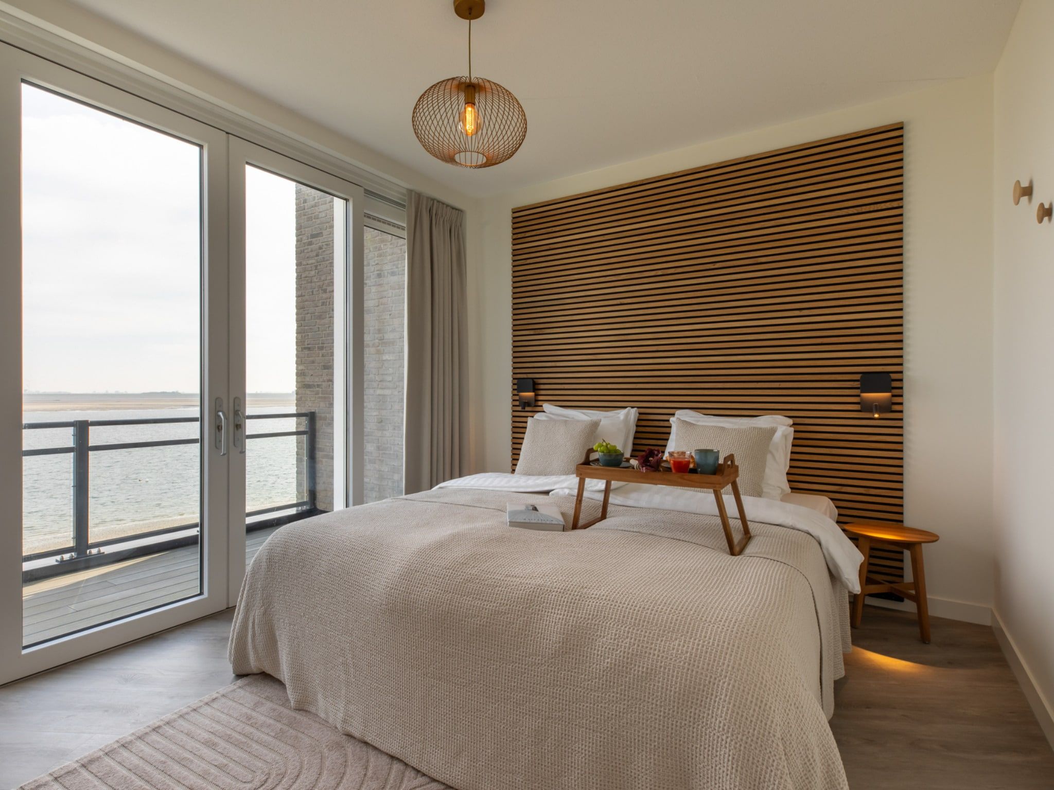 Een slaapkamer van Luxe appartement Vista Maris - Havenweg 8-36 'Oester Oase' in Sint-Annaland