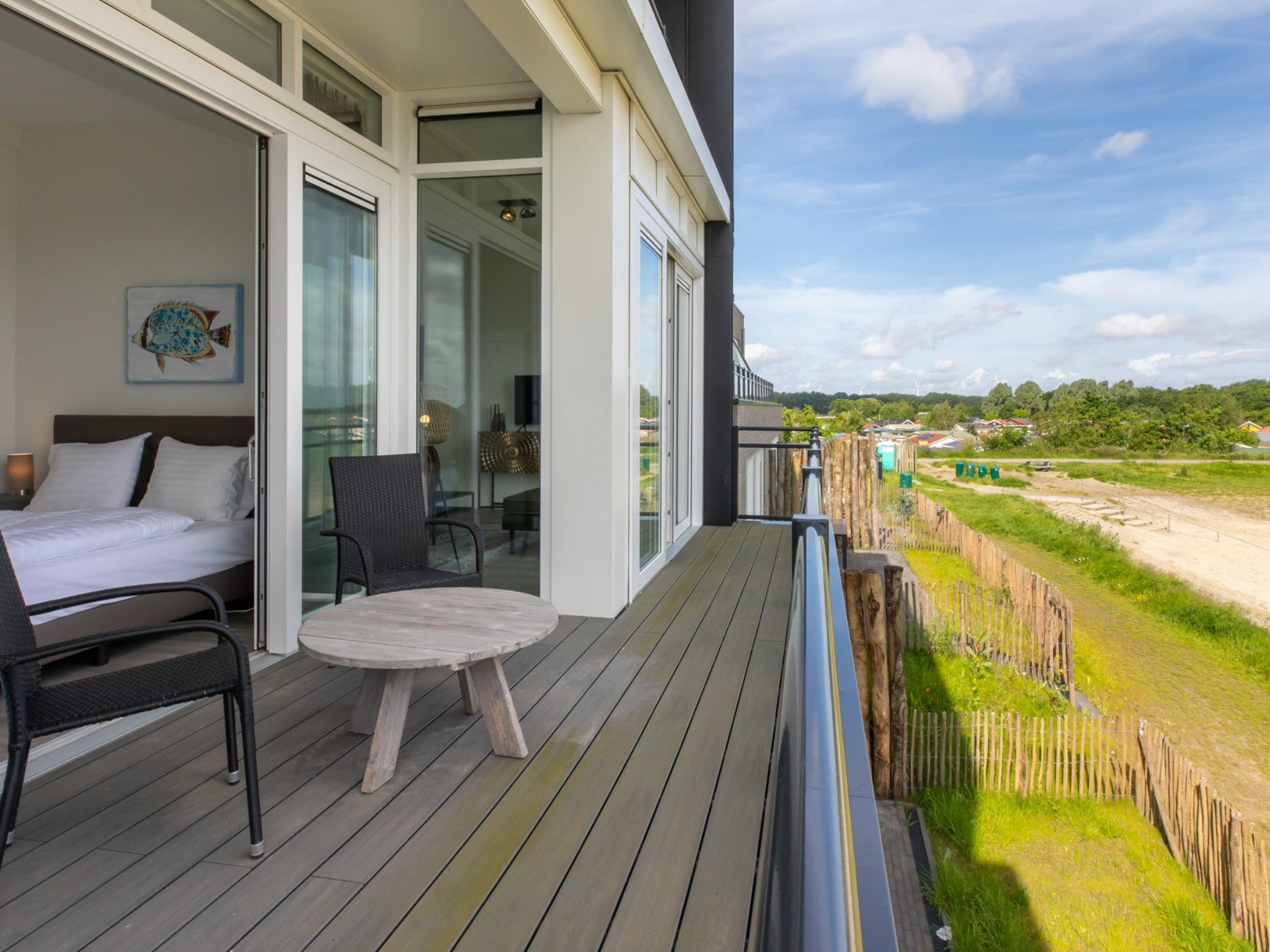 De tuin van Luxe appartement Vista Maris - Havenweg 8-38  Sint-Annaland in Sint-Annaland