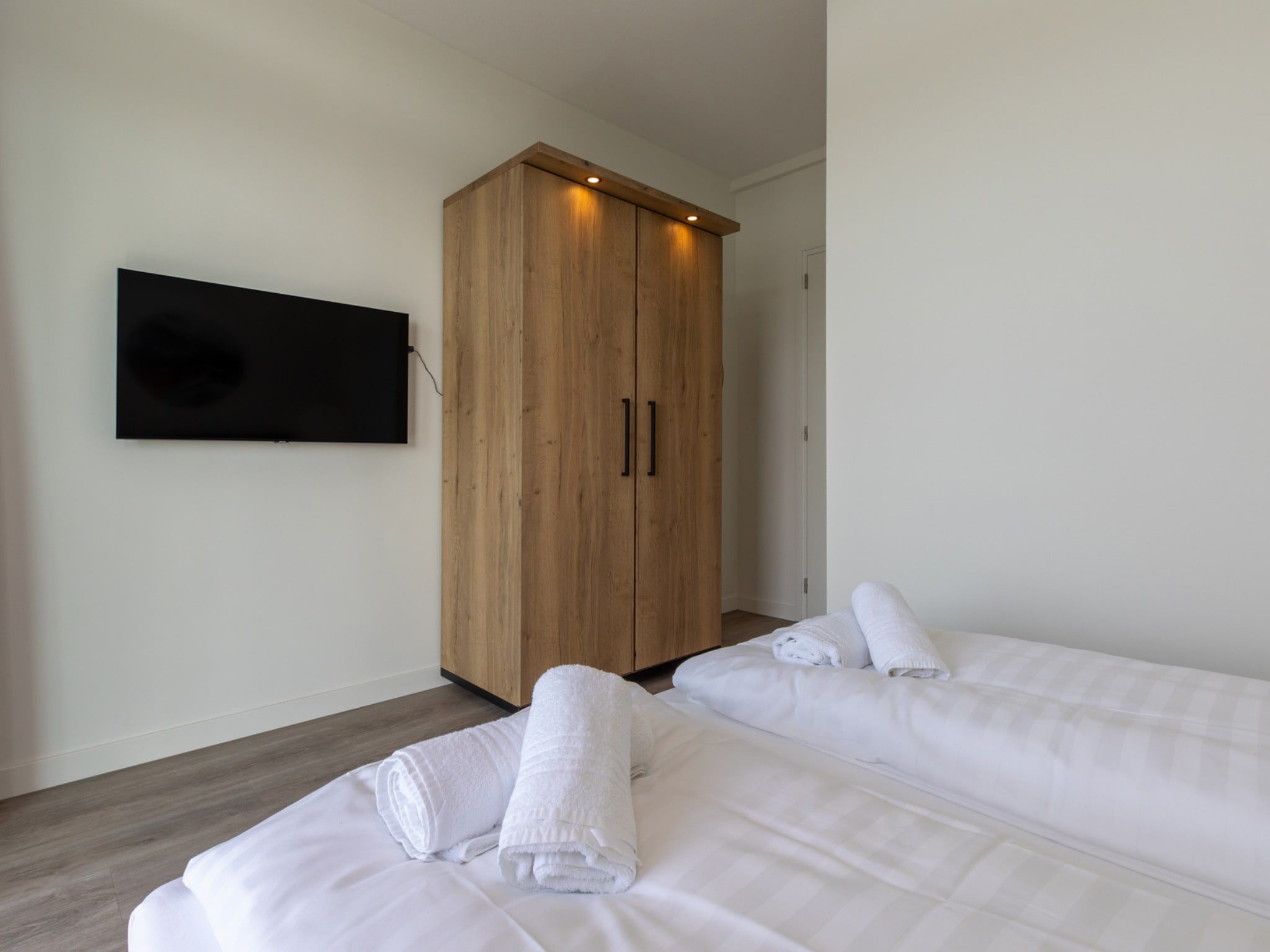 Een slaapkamer van Luxe appartement Vista Maris - Havenweg 8-38  Sint-Annaland in Sint-Annaland