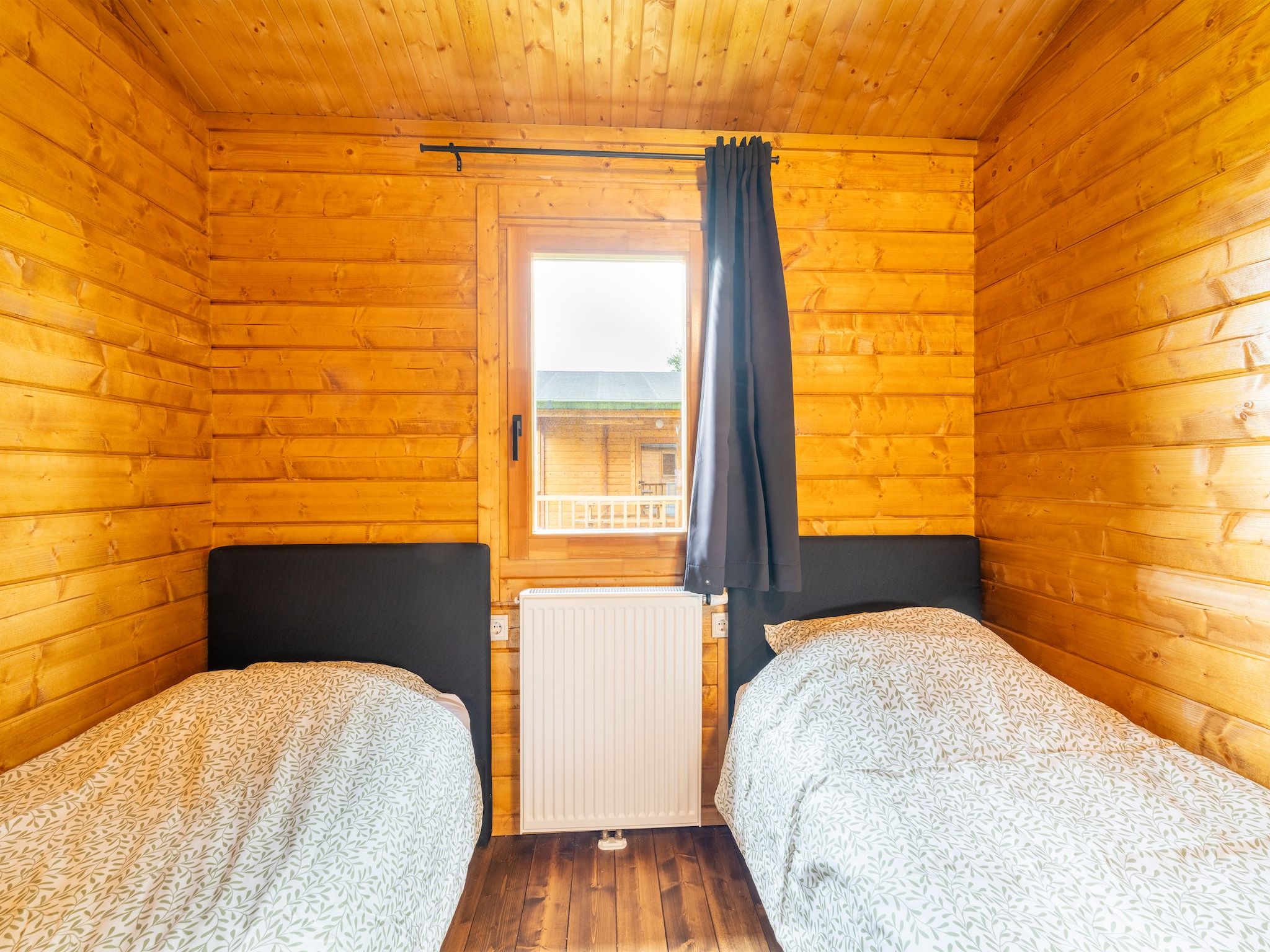 Een slaapkamer van Chalet Riga in Valkenswaard