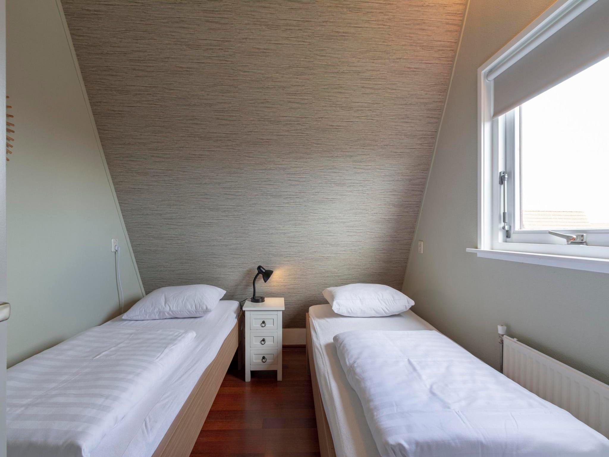 Een slaapkamer van Yperhof 58 in Julianadorp aan Zee