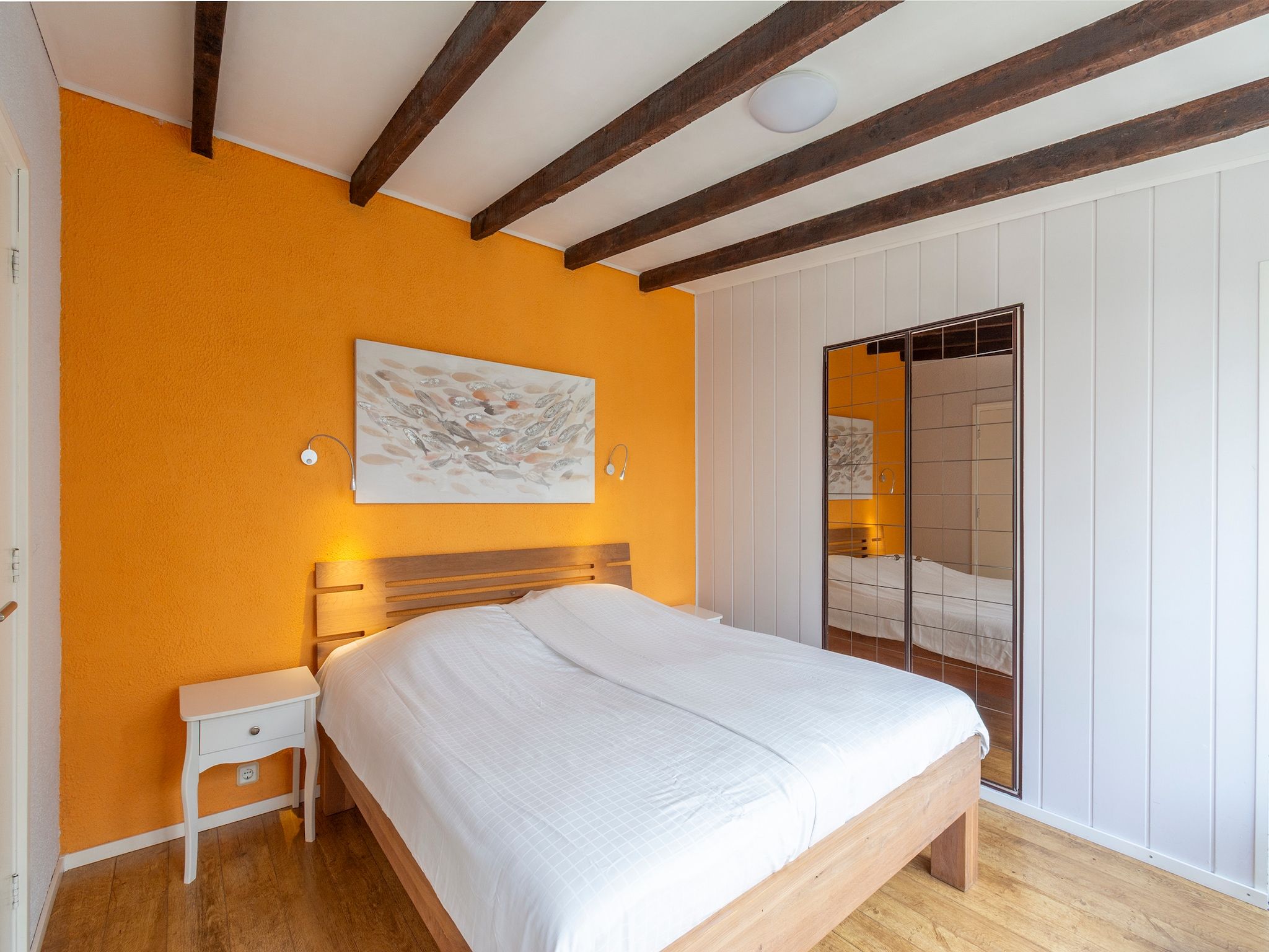 Een slaapkamer van Duinland 135 in Sint Maartenszee