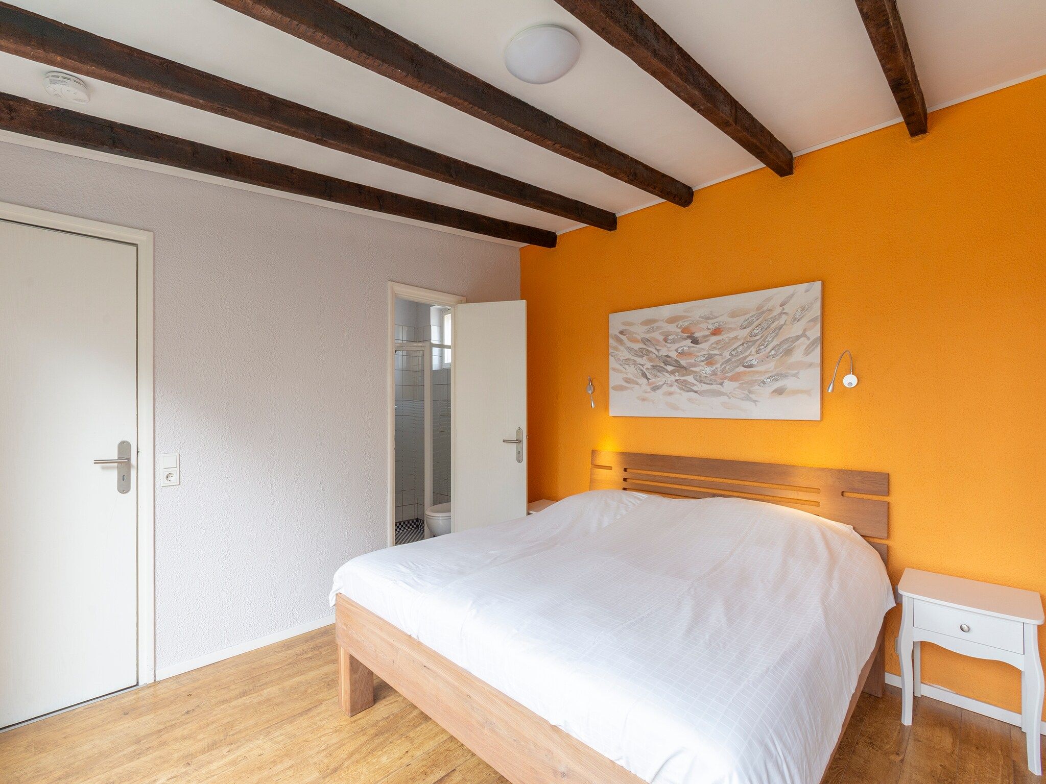 Een slaapkamer van Duinland 135 in Sint Maartenszee