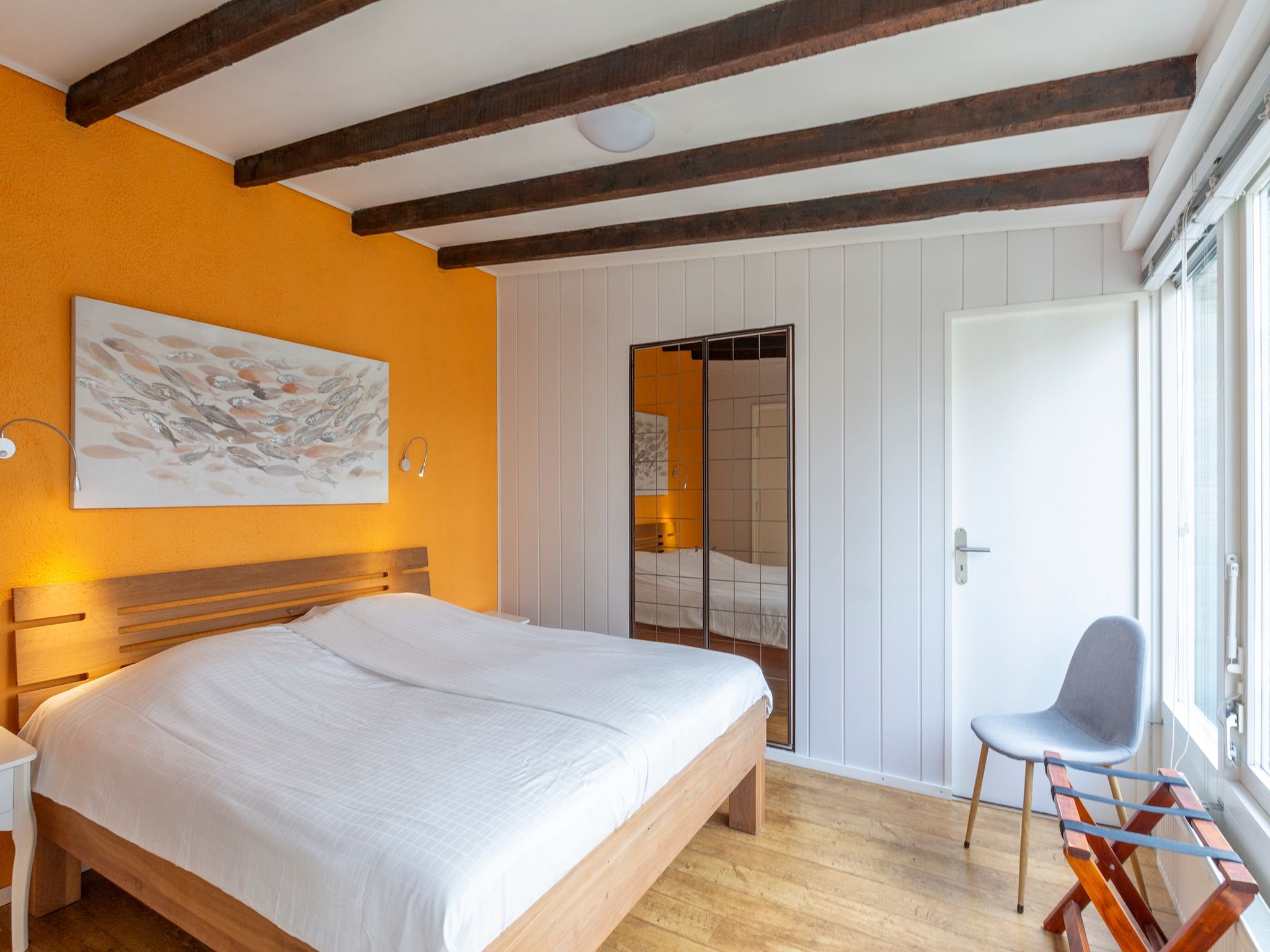 Een slaapkamer van Duinland 135 in Sint Maartenszee