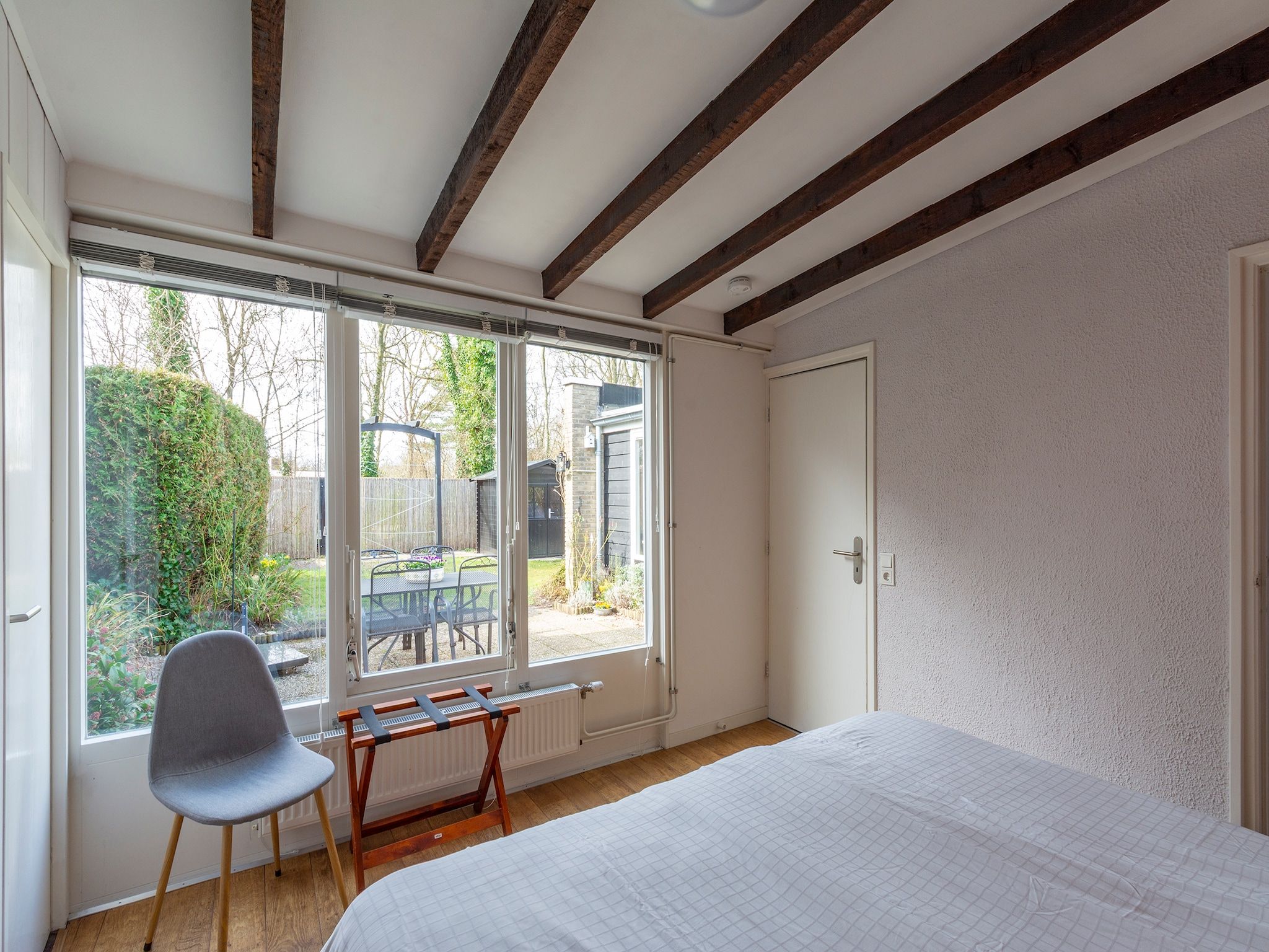 Een slaapkamer van Duinland 135 in Sint Maartenszee