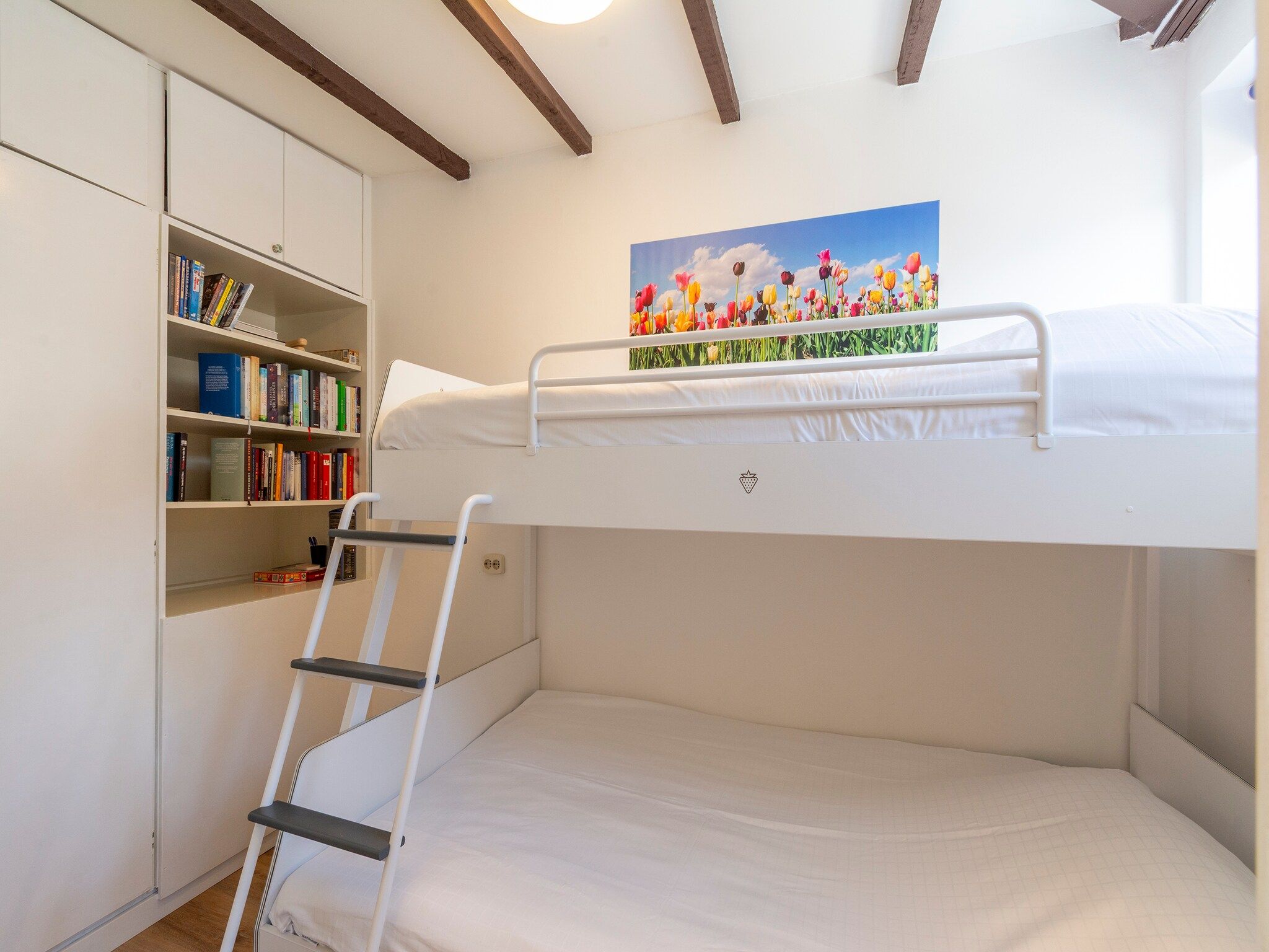 Een slaapkamer van Duinland 135 in Sint Maartenszee