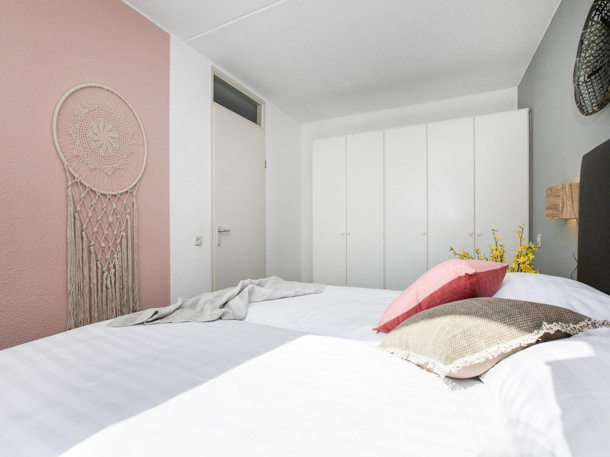 Een slaapkamer van Résidence Juliana 56 in Julianadorp aan Zee
