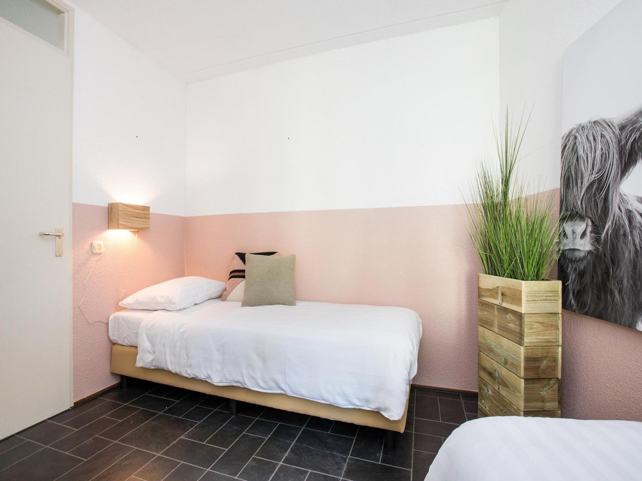 Een slaapkamer van Résidence Juliana 56 in Julianadorp aan Zee