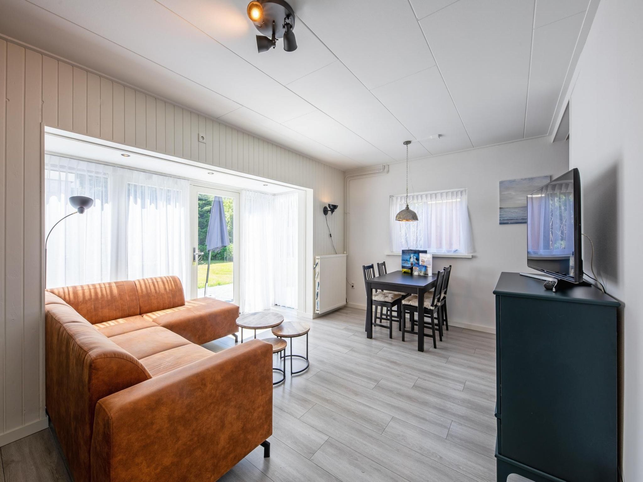De woonkamer van Strandhuys Zeester in De Koog