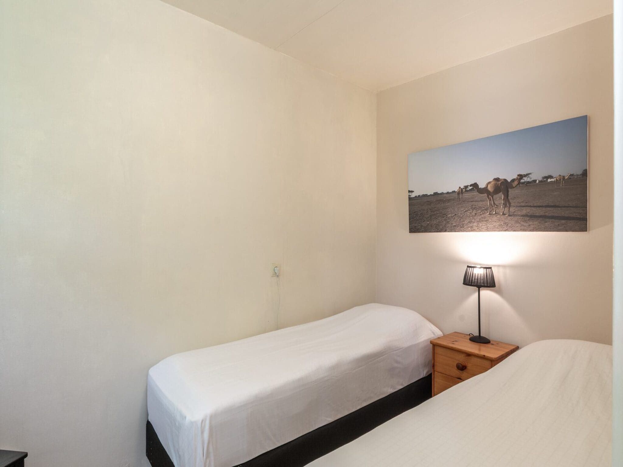 Een slaapkamer van Duinland 186 in Sint Maartenszee