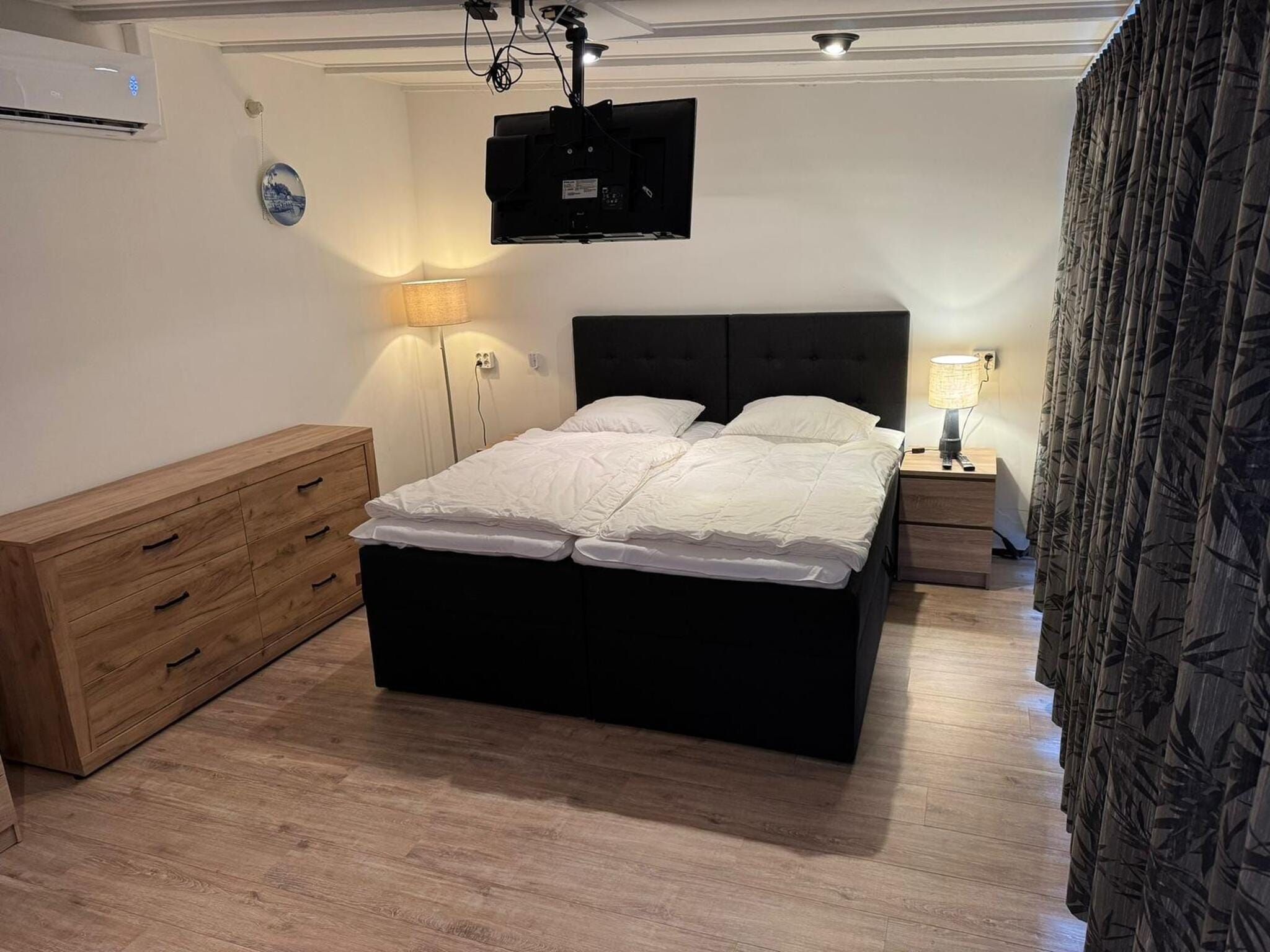 Een slaapkamer van Duinland 115 in Sint Maartenszee